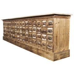 1920s Large Low Pine Hardware Shop Bank of Drawers, Sixty Eight Drawers