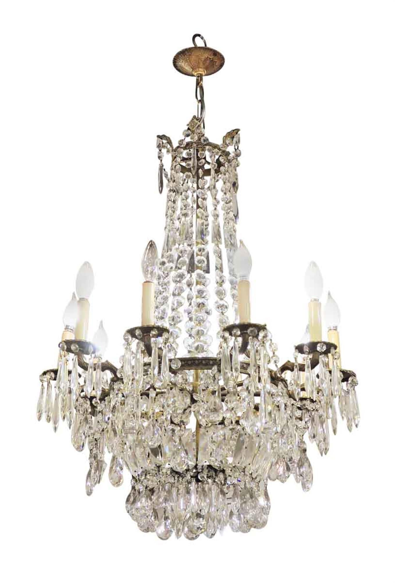 Large-scale elegant crystal chandelier with 10 arms from the 1920s. This can be seen at our 2420 Broadway location on the upper west side in Manhattan.