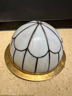 Artefacto de iluminación de cristal emplomado de los años 20