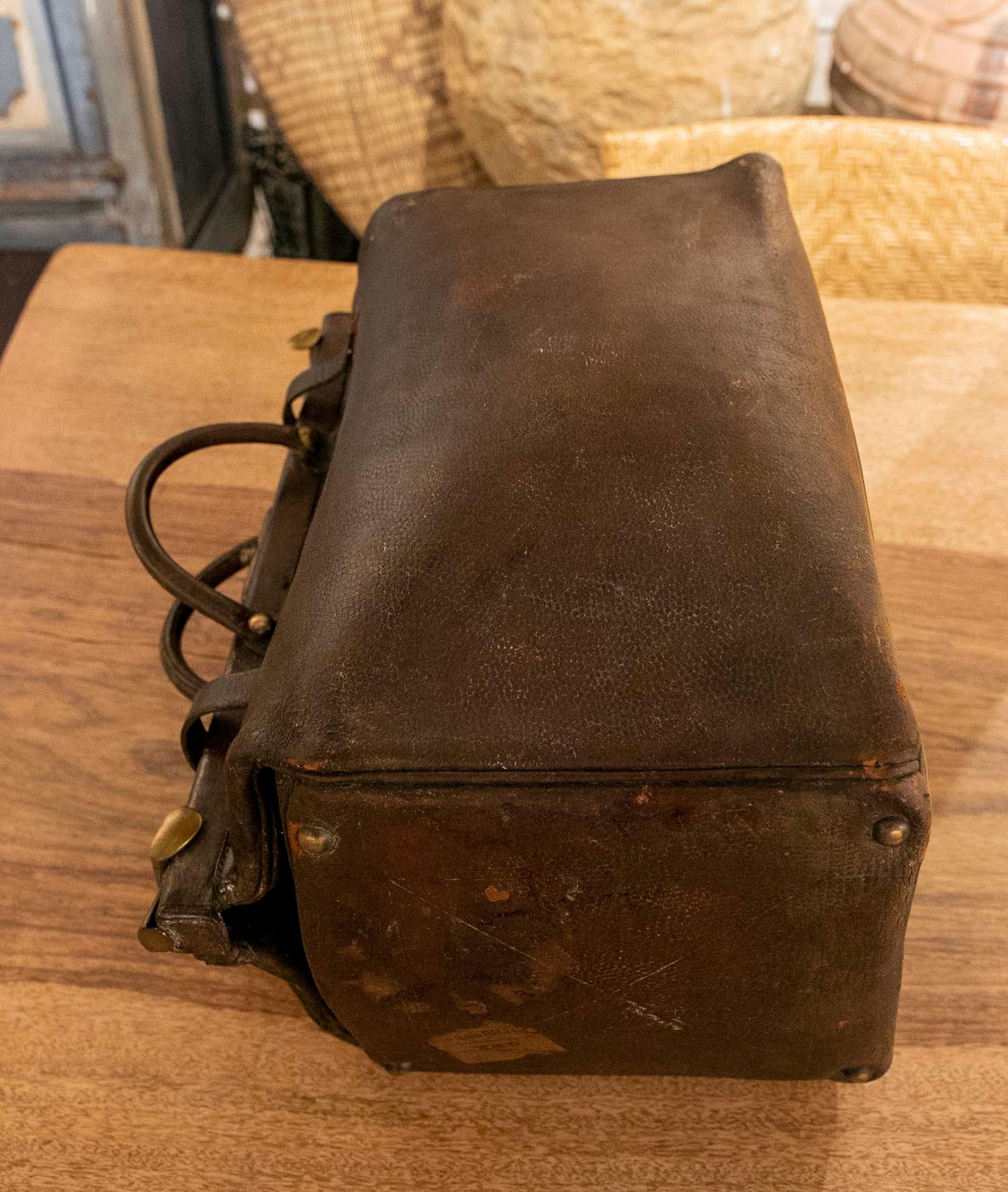 1920s Leather Suitcase Bank with Original Wax Seals and Bronze Closures For Sale 13
