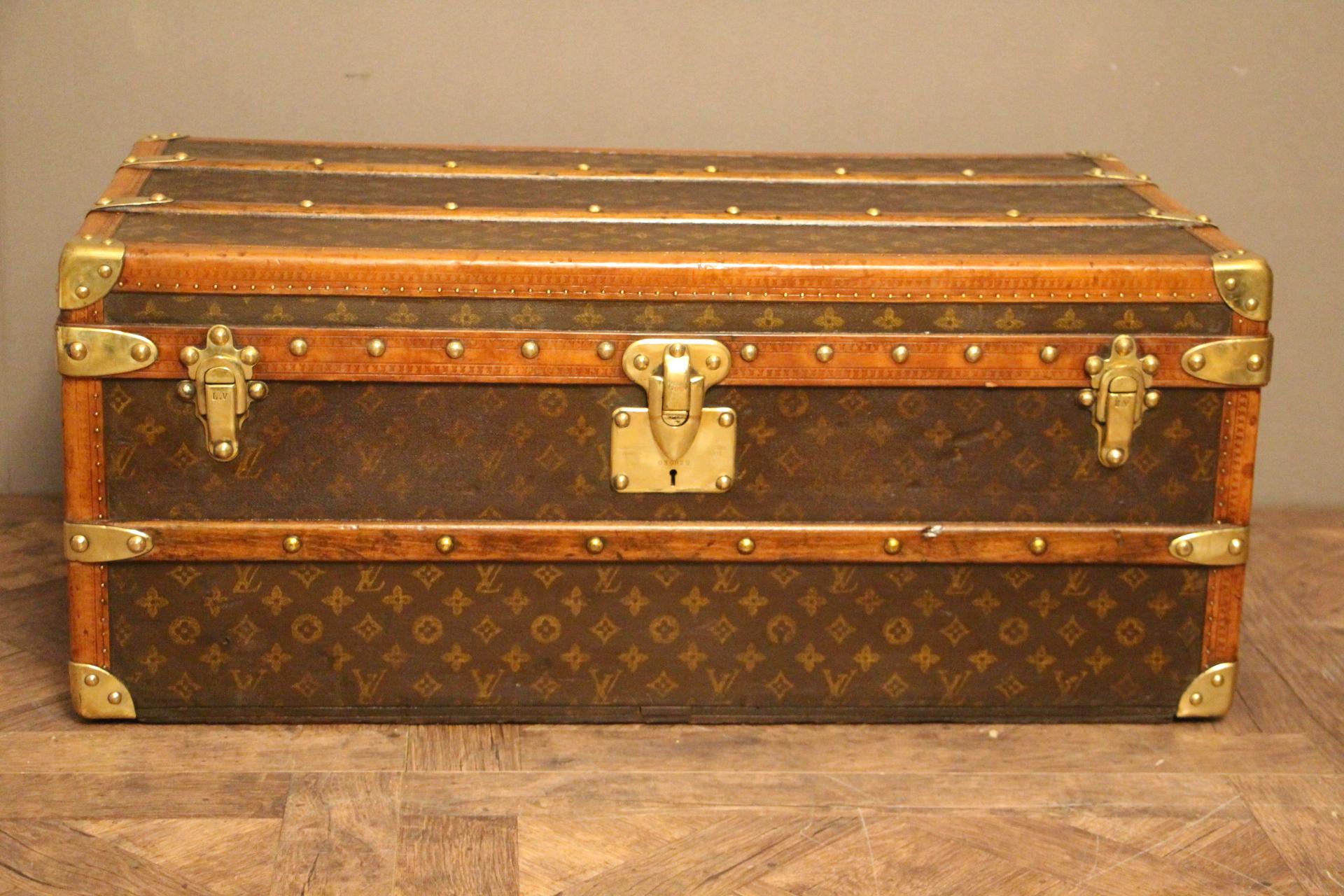 This beautiful Louis Vuitton cabin trunk features stencilled LV monogram canvas, LV stamped brass locks and studs, brass corners, leather side handles and lozine trim. Pink and white customised painted stribes on its sides.
Inside is all original