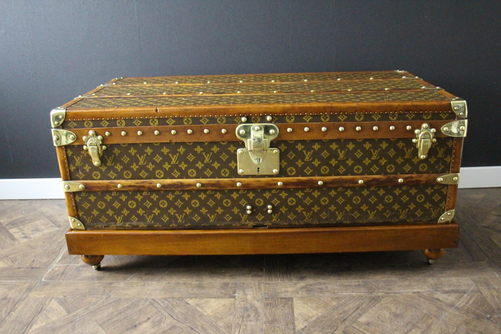 This very nice Louis Vuitton trunk features hand stenciled monogram canvas , light honey color lozine trim and Louis Vuitton stamped solid brass locks and clasps, Louis Vuitton stamped studs as well as large leather side handles. Its patina is warm