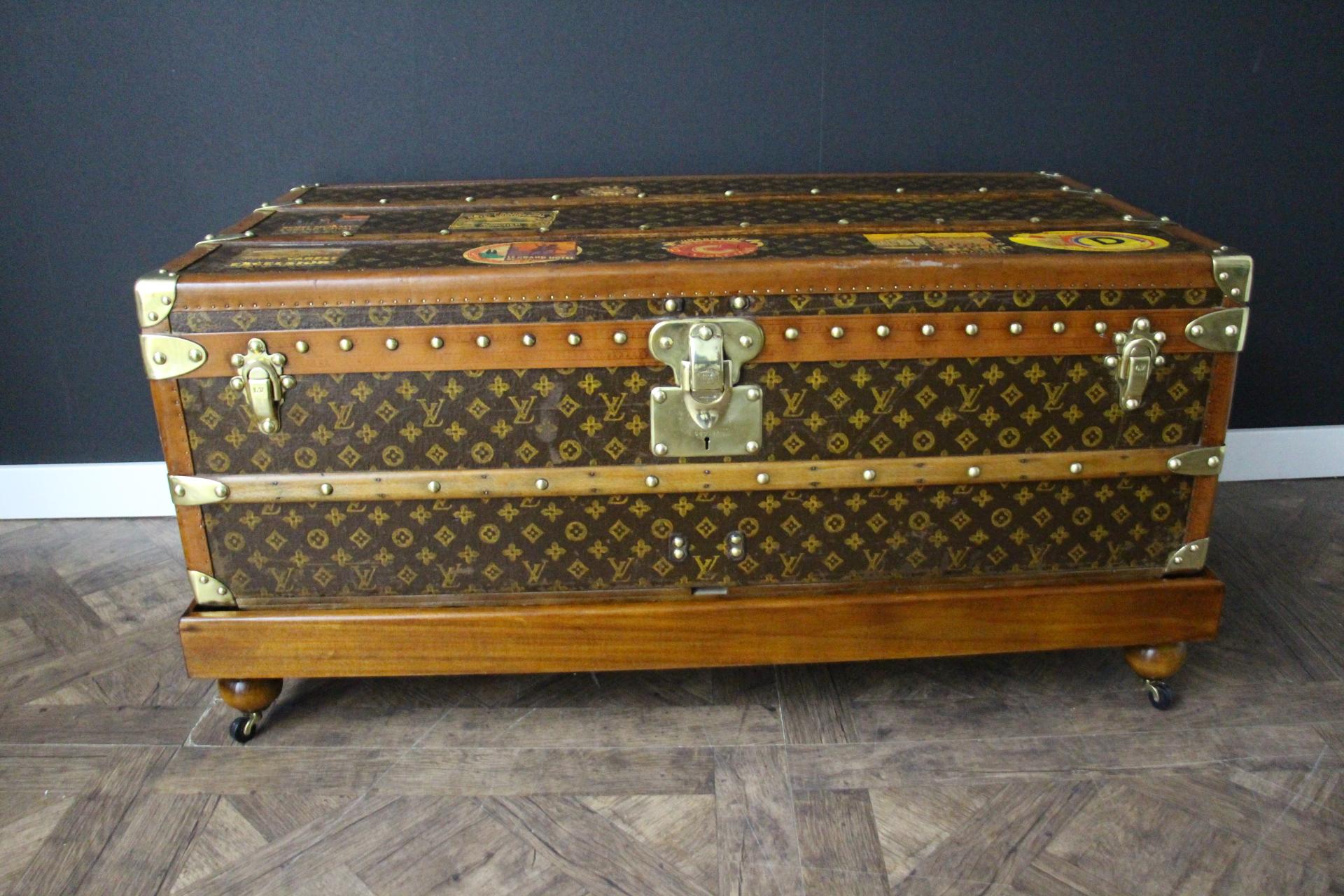 This very nice Louis Vuitton trunk features hand stenciled monogram canvas , light honey color lozine trim and Louis Vuitton stamped solid brass locks and clasps, Louis Vuitton stamped studs as well as large leather side handles. Its patina is warm