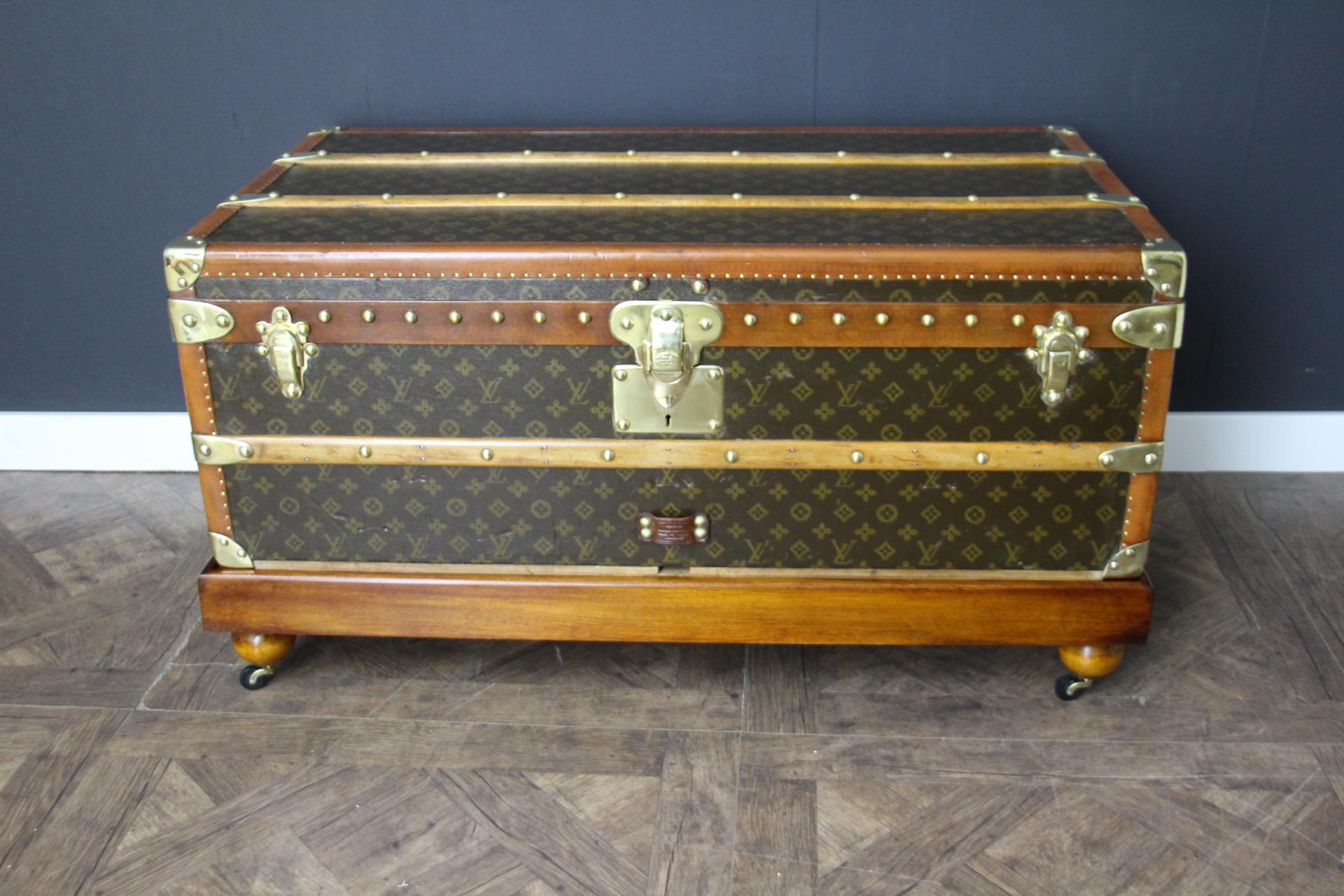 This very nice Louis Vuitton trunk features hand stenciled monogram canvas , light honey color lozine trim and Louis Vuitton stamped solid brass locks and clasps, Louis Vuitton stamped studs as well as large leather side handles. Its patina is warm