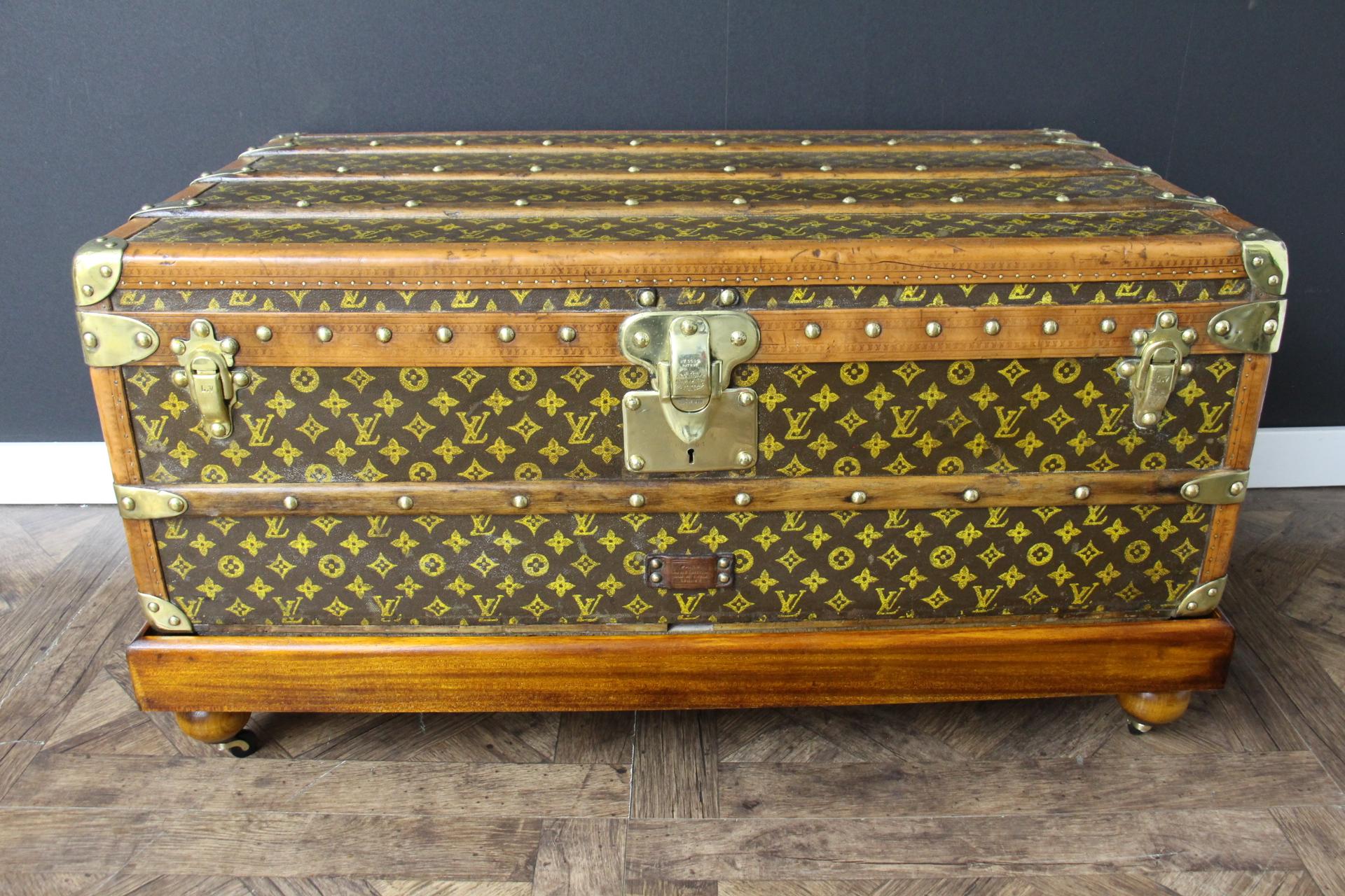 This very nice Louis Vuitton trunk features hand stenciled monogram canvas , light honey color lozine trim and Louis Vuitton stamped solid brass locks and clasps, Louis Vuitton stamped studs as well as large leather side handles. Its patina is warm