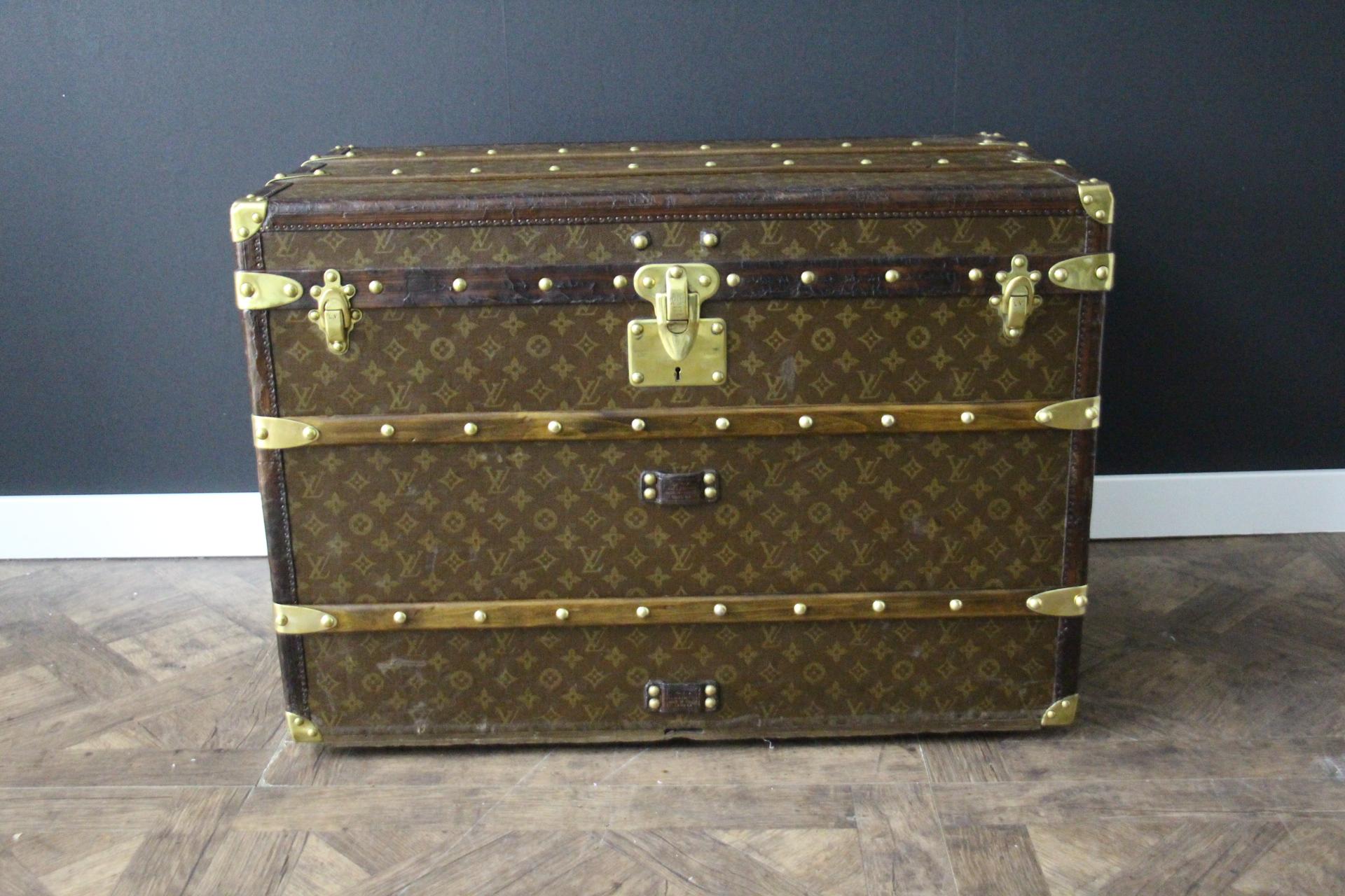 Superb Louis Vuitton steamer trunk featuring stenciled canvas, all leather trim in deep chocolate color, solid brass Louis Vuitton stamped clasps, lock and studs, solid brass corners and solid brass LV stamped side handles. Measure: 76 cm
Customized