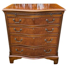 1920’s Mahogany Serpentine Chest Of Drawers with brushing slide