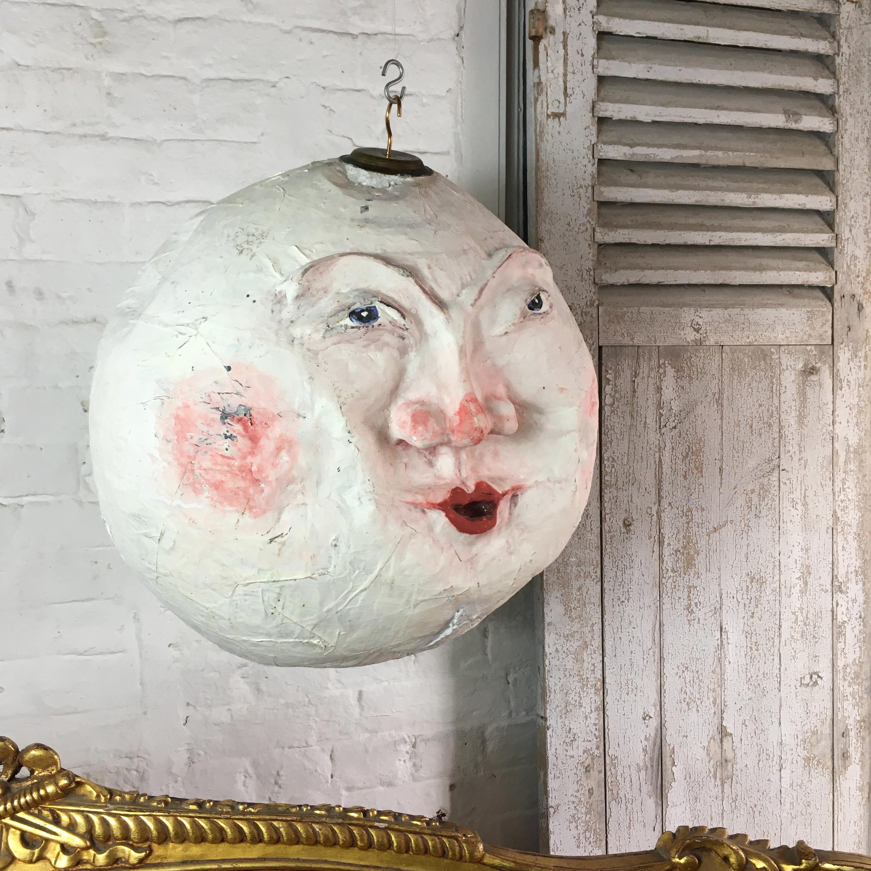 1920s 'Man In The Moon' Papier mâché Prop. Theatre / stage prop. Handmade and finished with beautiful enigmatic hand painted face. 50cm height, 50cm width approx. Metal plate and hook set into the papier mâché at the top for hanging. Fantastic