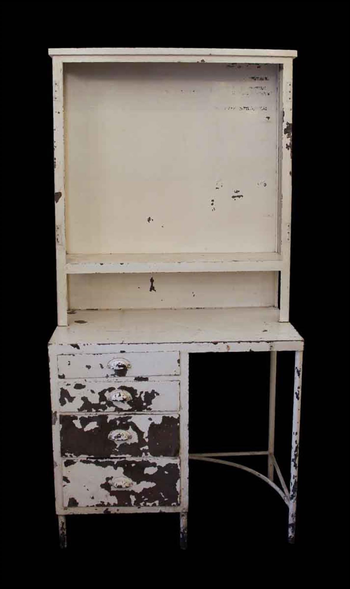 1920s open top medical surgical cabinet or desk. The front doors are missing, but holes are there for the hinges if you want to restore. However, it looks nice open as well, especially for display! Shelves can be made for this if you'd like-please