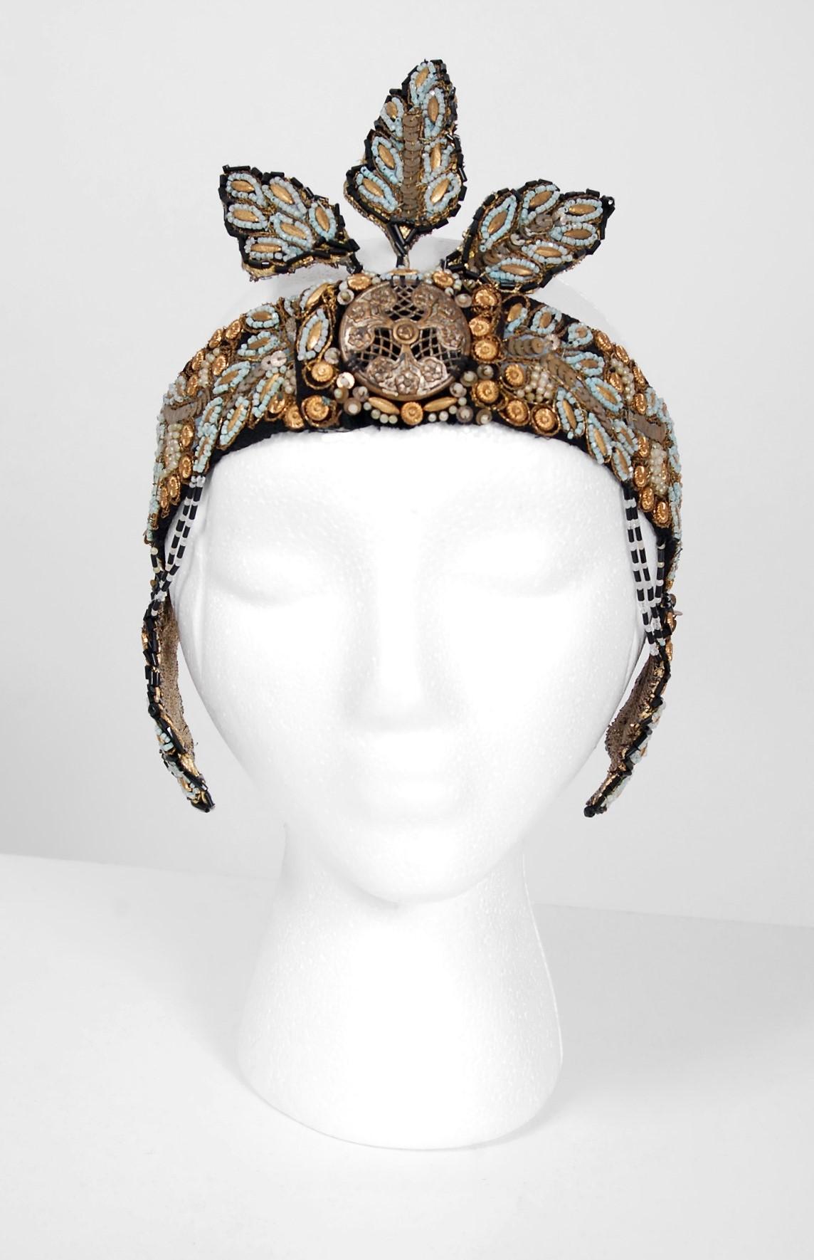 Breathtaking French Couture metallic-gold and turquoise flapper formal headpiece dating back to the mid 1920's. This is, without a doubt, one of the most extraordinary antique crowns I have ever laid eyes on. Gorgeous tube glass-beads and