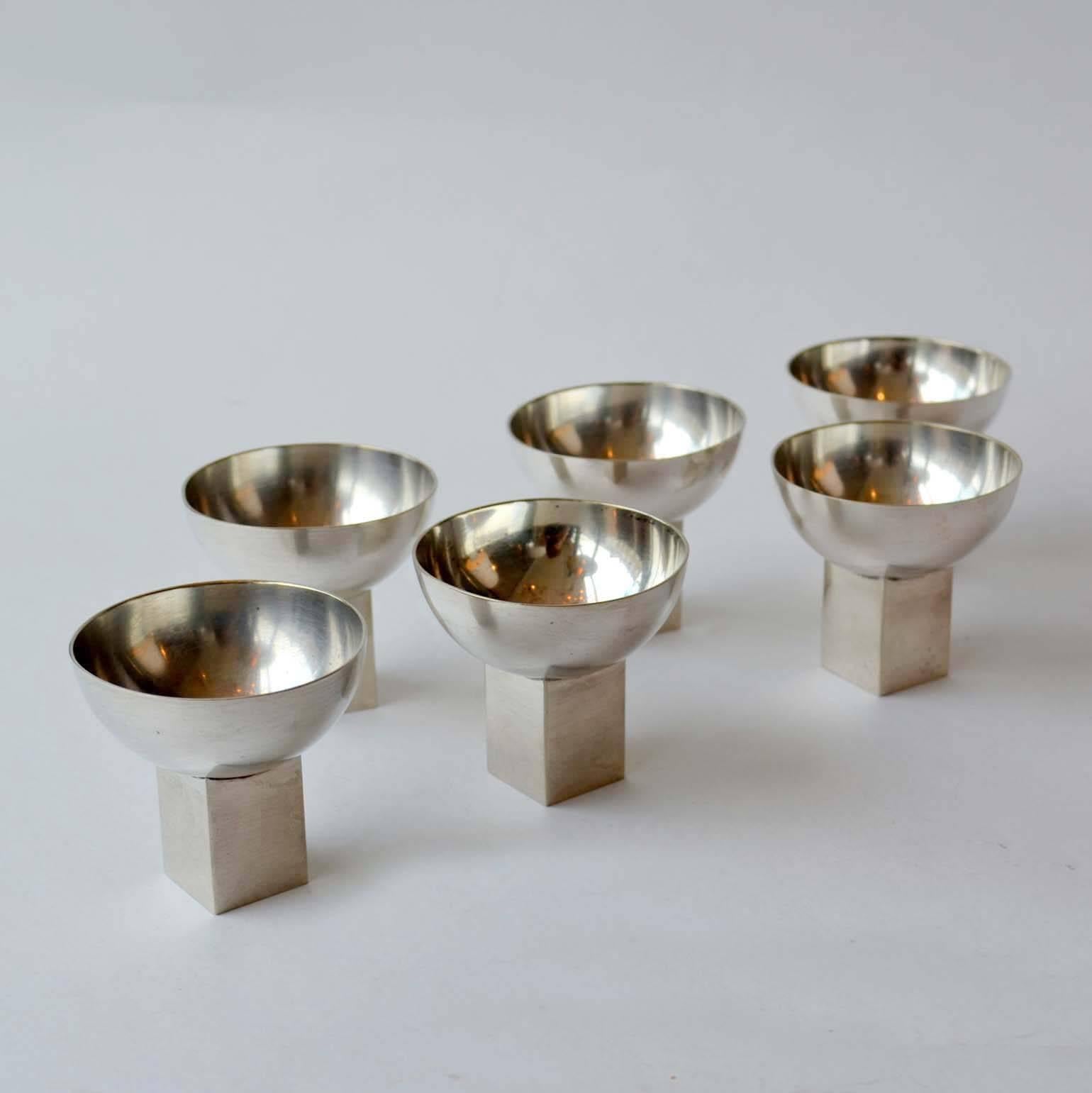 Set of silver plated liqueur glasses in Bauhaus style based on geometrical forms made in the 1920s. They are handmade in Germany, 1920s.