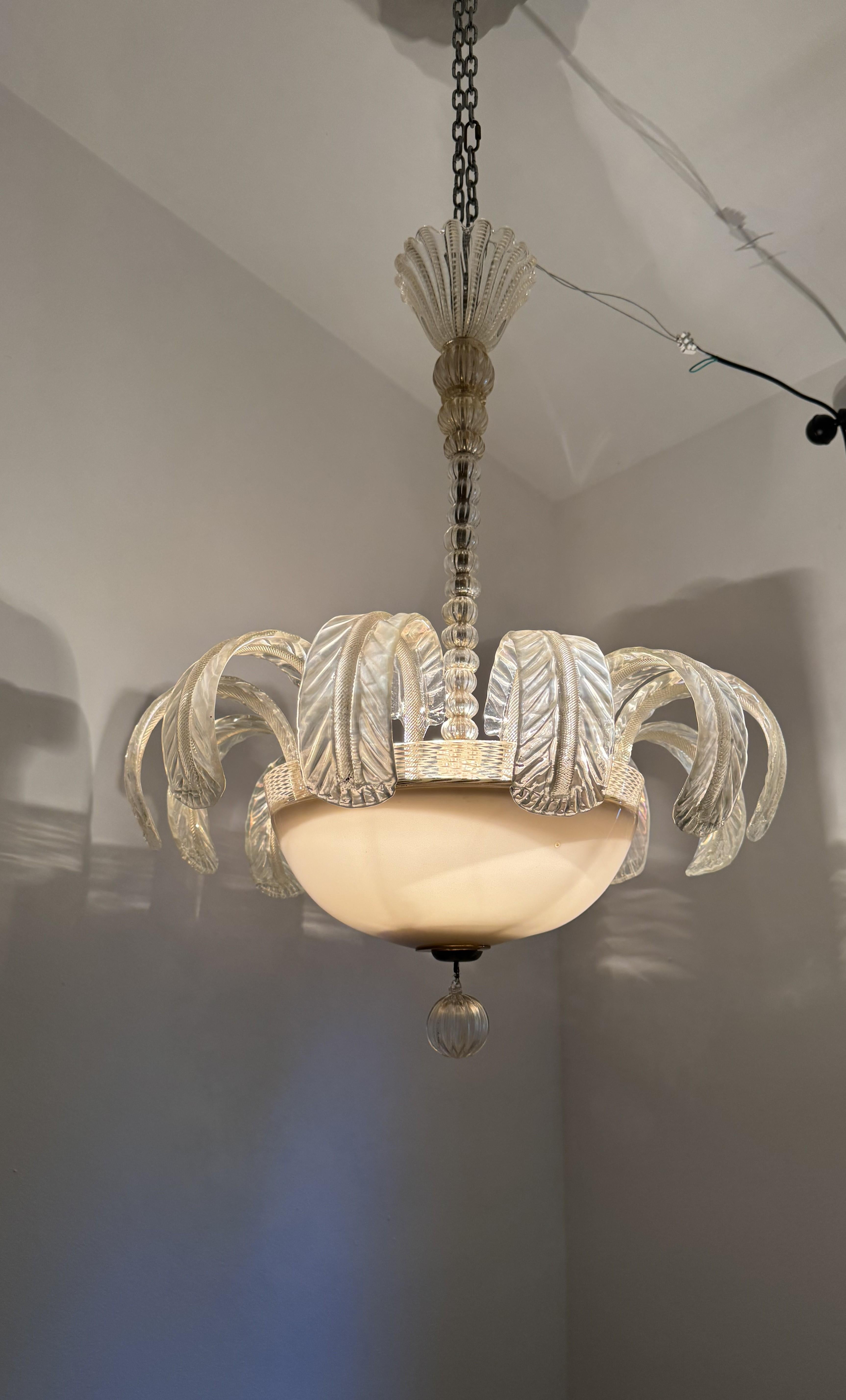 Beautiful Art Deco 3 light chandelier in the shape of a water fountain. 
Manufactured in Murano Italy circa 1920’s, this chandelier  was executed with several different techniques, the “water jets” are in gold dust and have an iridescent shine,
