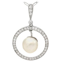 1920s Natural Pearl and Diamond Platinum Pendant
