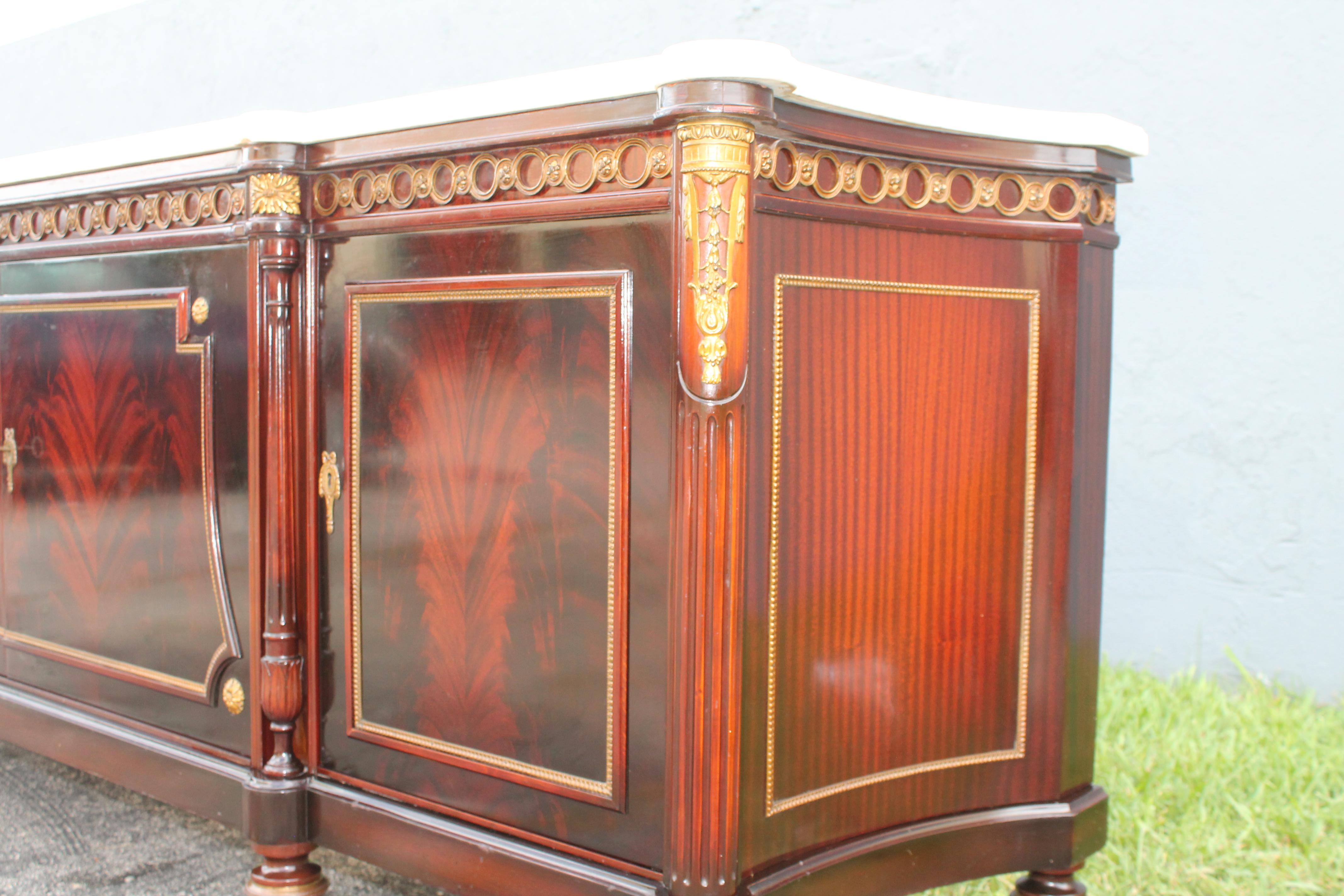 1920's Neoclassic style Marble Top Flame Mahogany Buffet/ Sideboard/ Credenza In Good Condition For Sale In Opa Locka, FL