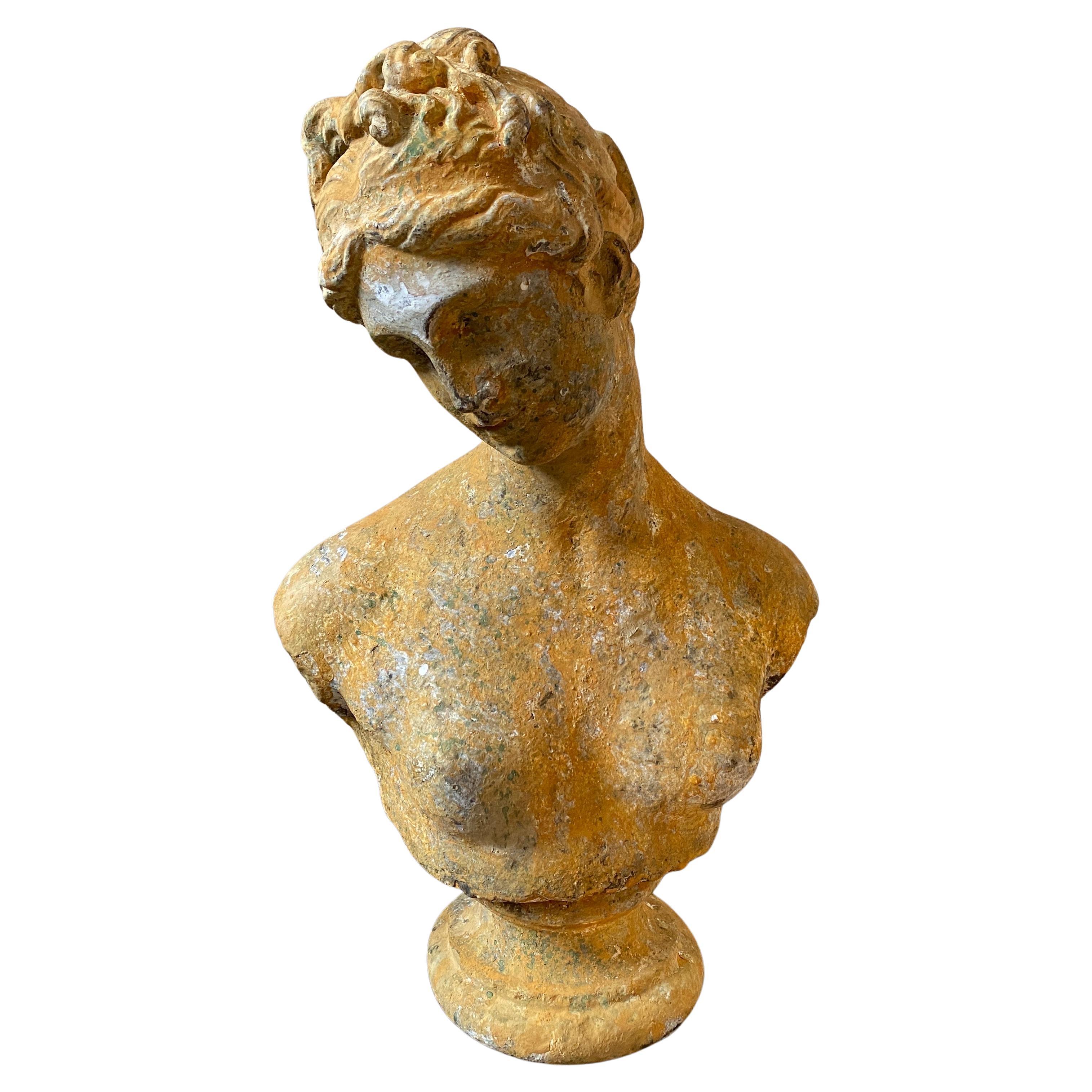 An old statue of Diane, it's very heavy and it could be in marble powder it has been made in early 20th century, the patina it's due to exposition to climate, it was placed in a winter garden in Sicily.