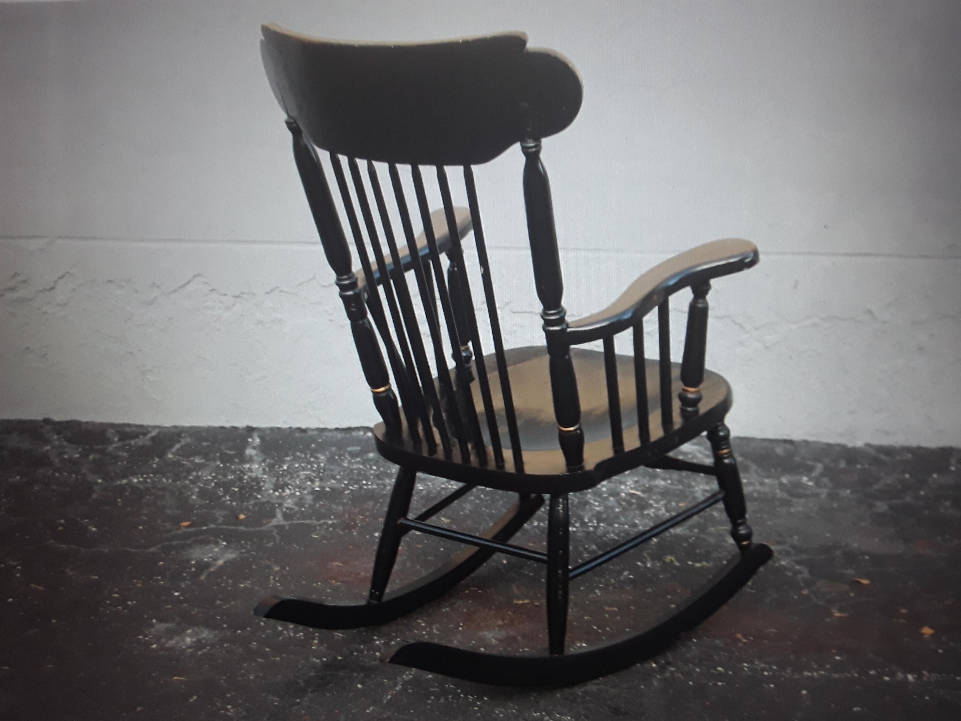 black and gold rocking chair