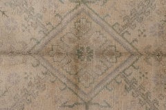 1920s Neutral Turkish Oushak Rug with Green Accents and a Gray Border