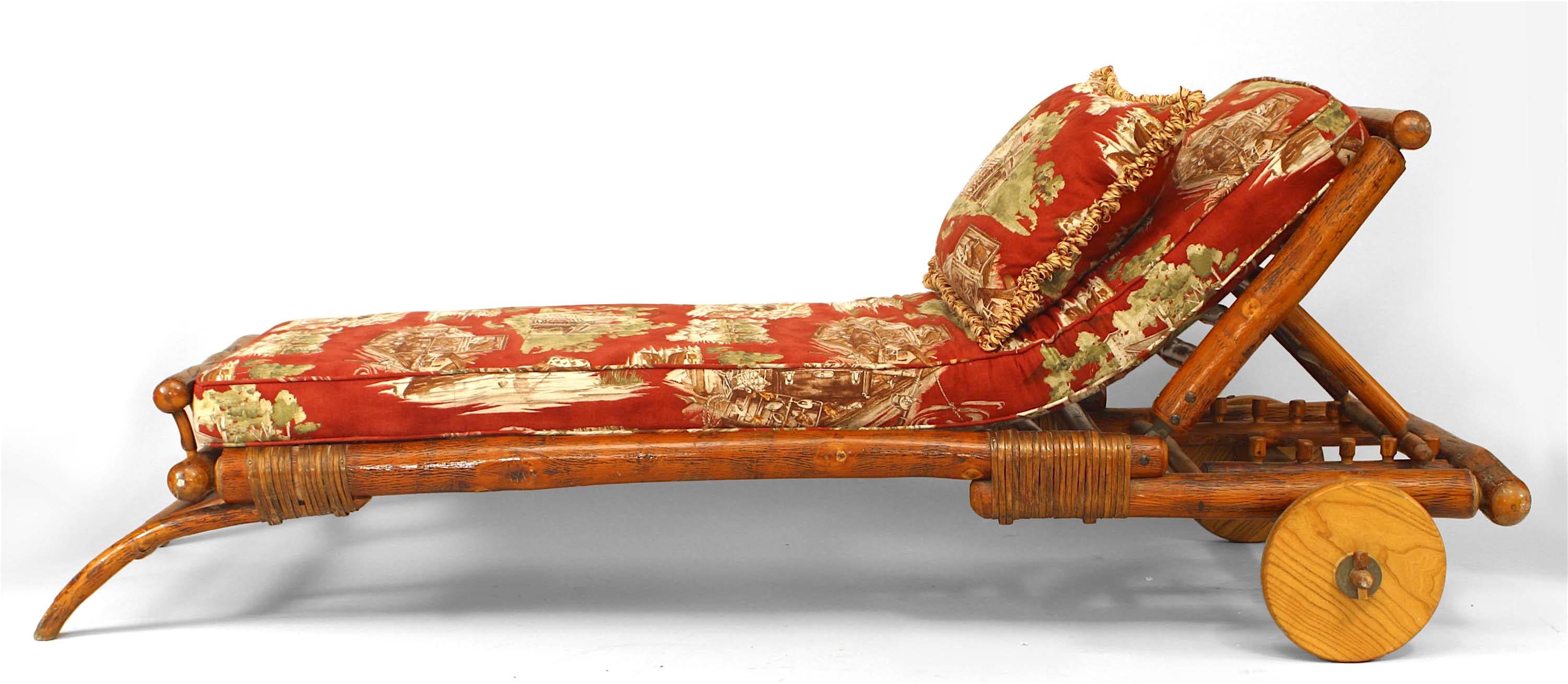 American Rustic Old Hickory (1920s) adjustable chaise with woven trim and wheels with linen upholstered cushions with fishing camp scenes (branded: Old Hickory Martinsville).
 