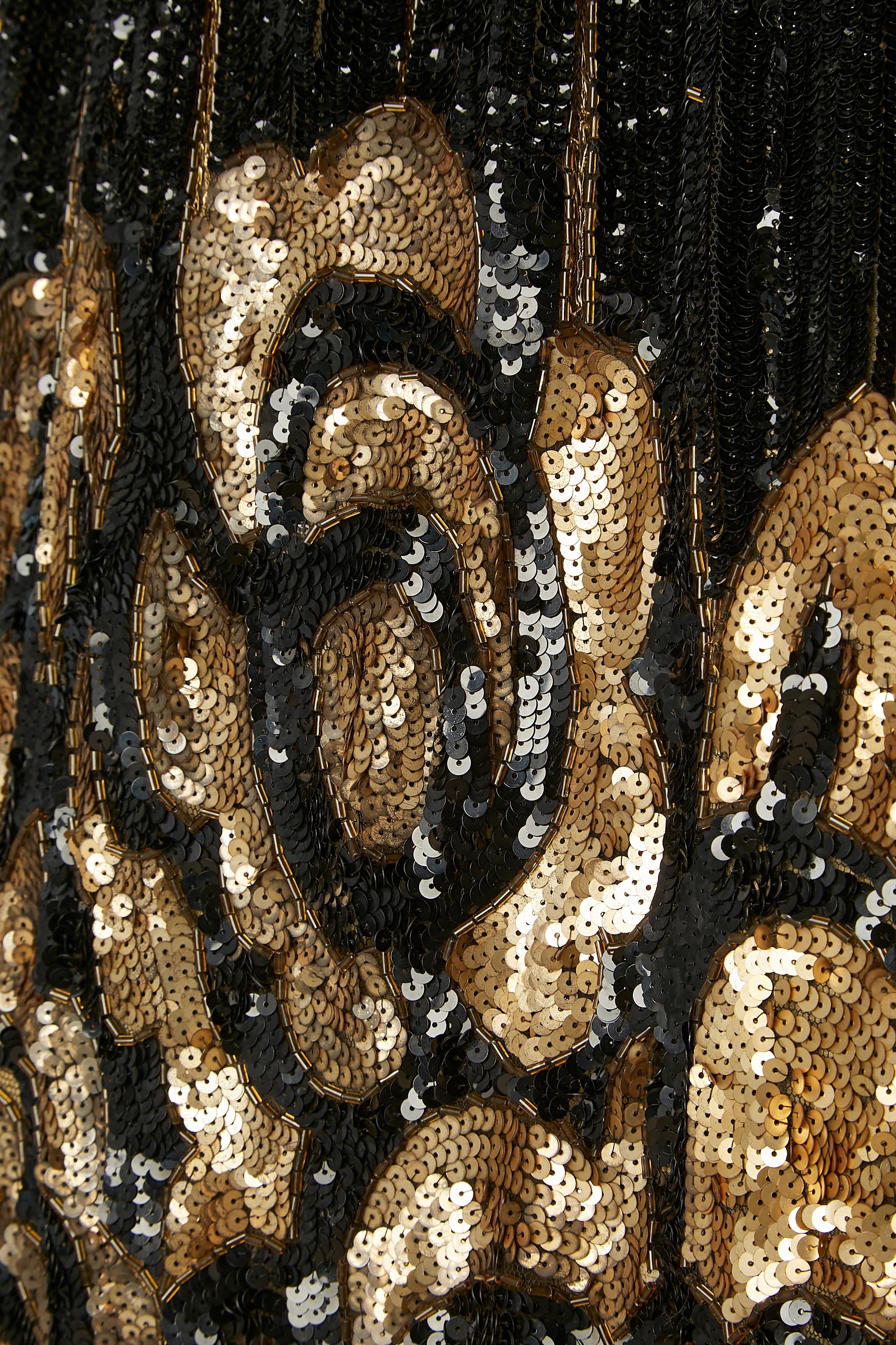 Black 1920's Opera cape in gold and black sequins with silk velvet orange lining  For Sale