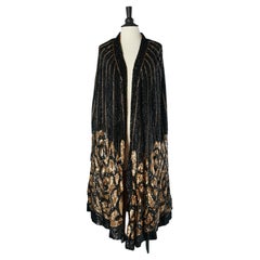 Antique 1920's Opera cape in gold and black sequins with silk velvet orange lining 