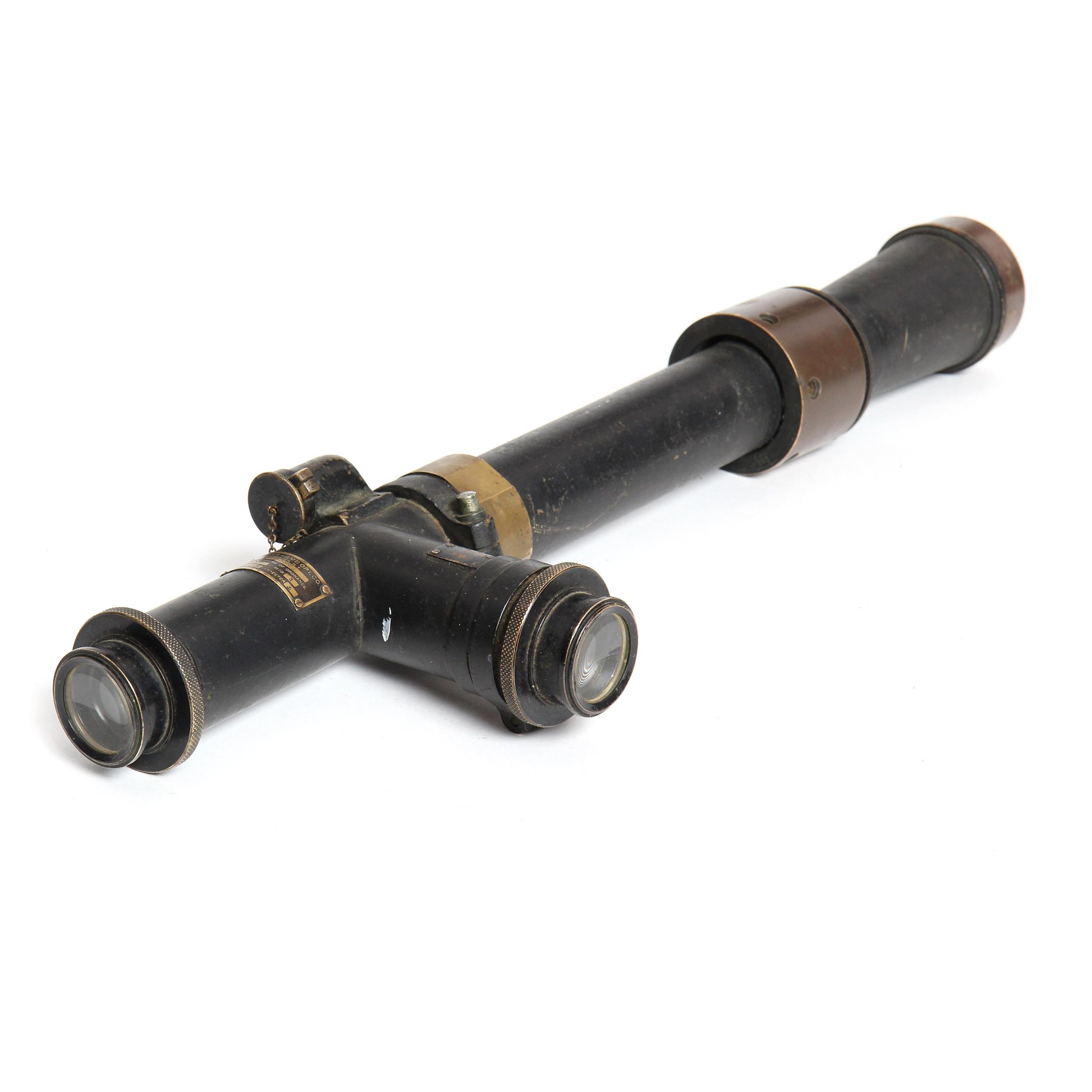 A telescope having precision ground lens, the iron and bronze casing having a wonderful patina.