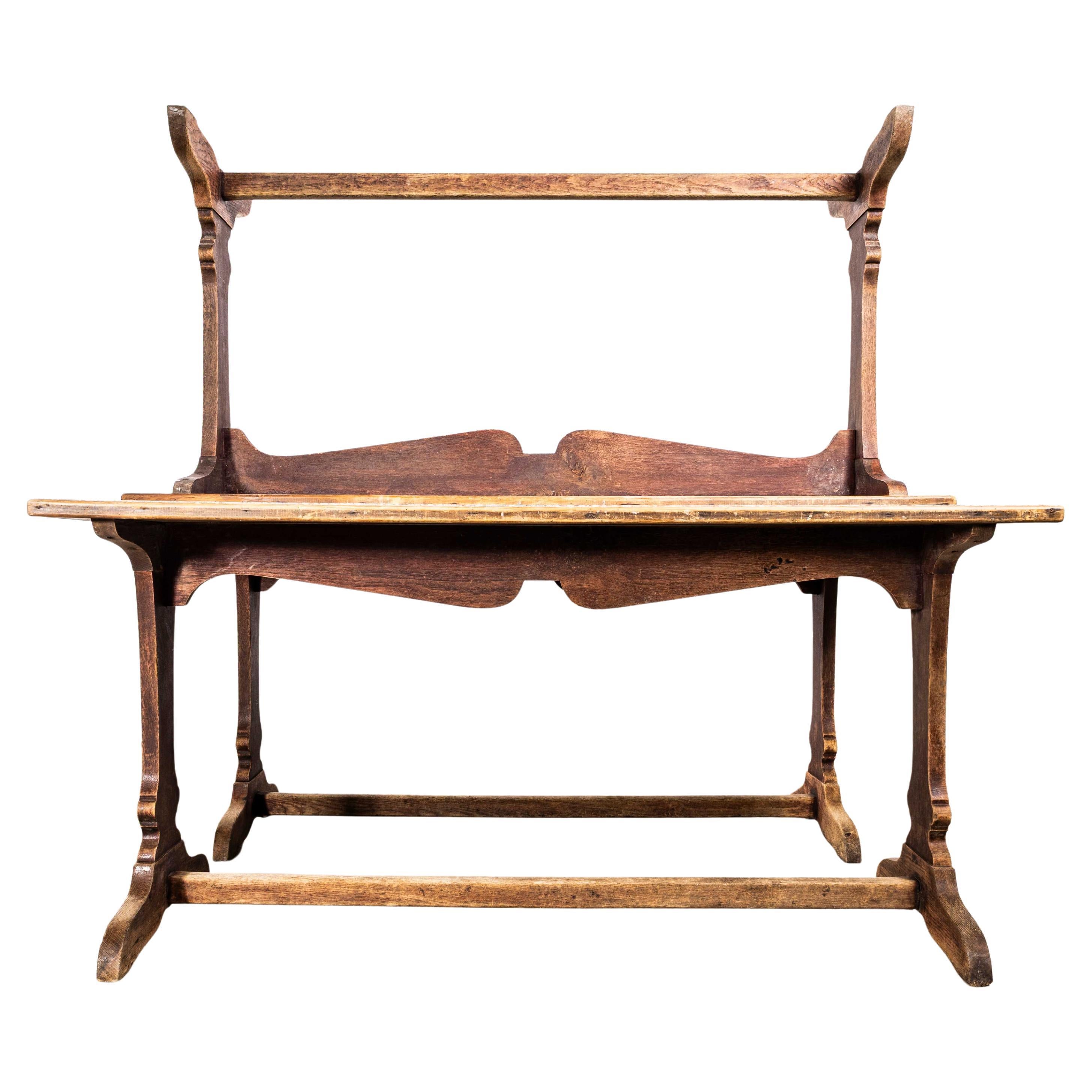 1920’s Large French Tabac Rectangular Dining Table. 

A rare original tabac table with a trestle style base and central stretcher. Made in solid oak throughout, the table has years of incredible age, and a rich sun drenched colour. The top is the