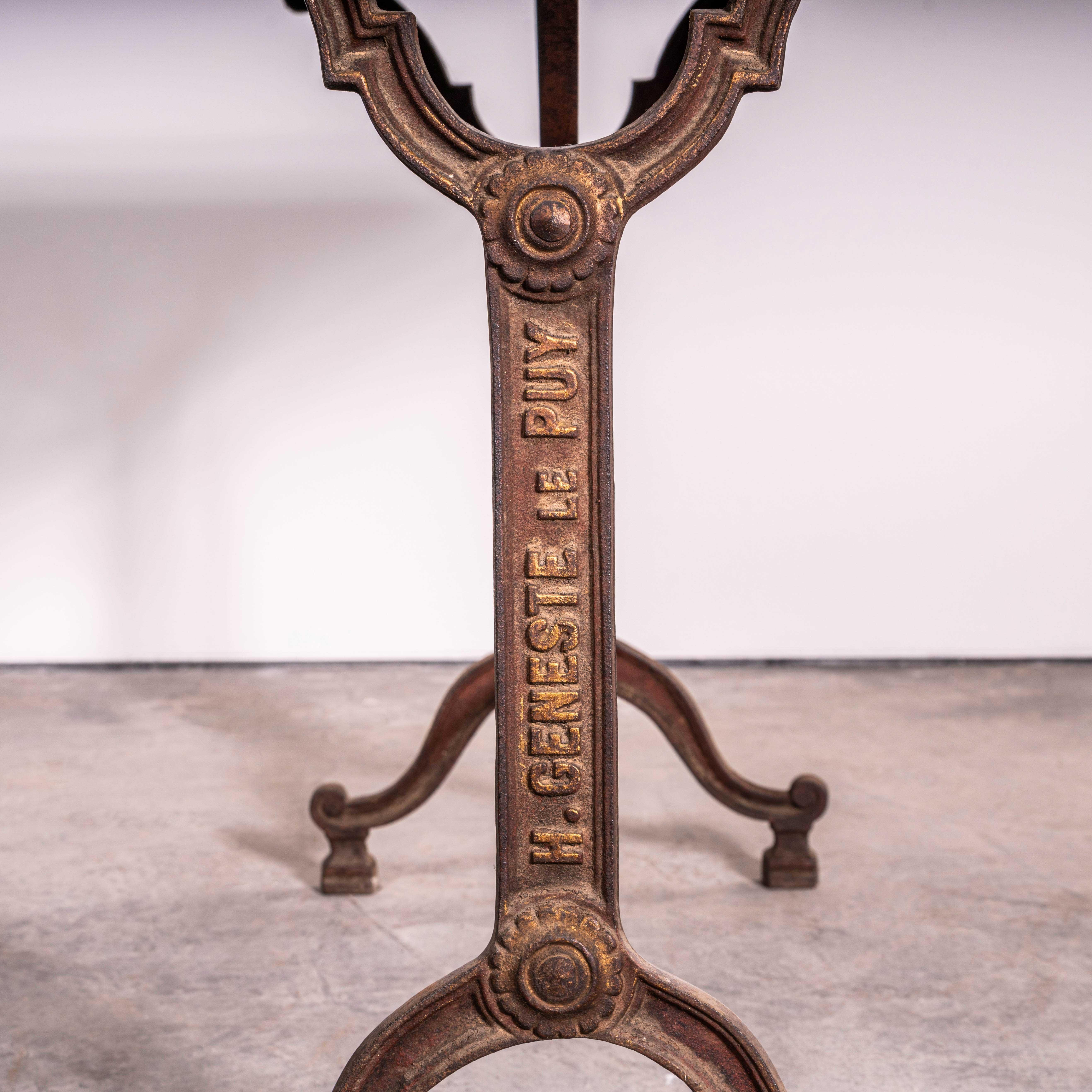 1920’s Original French Intricate Relief Cast Base Bistro Dining Table (3580). 

Classic very original French bistro table from the 1920’s by the maker H. Geneste. The base is very well detailed, the top is the original linoleum very well worn