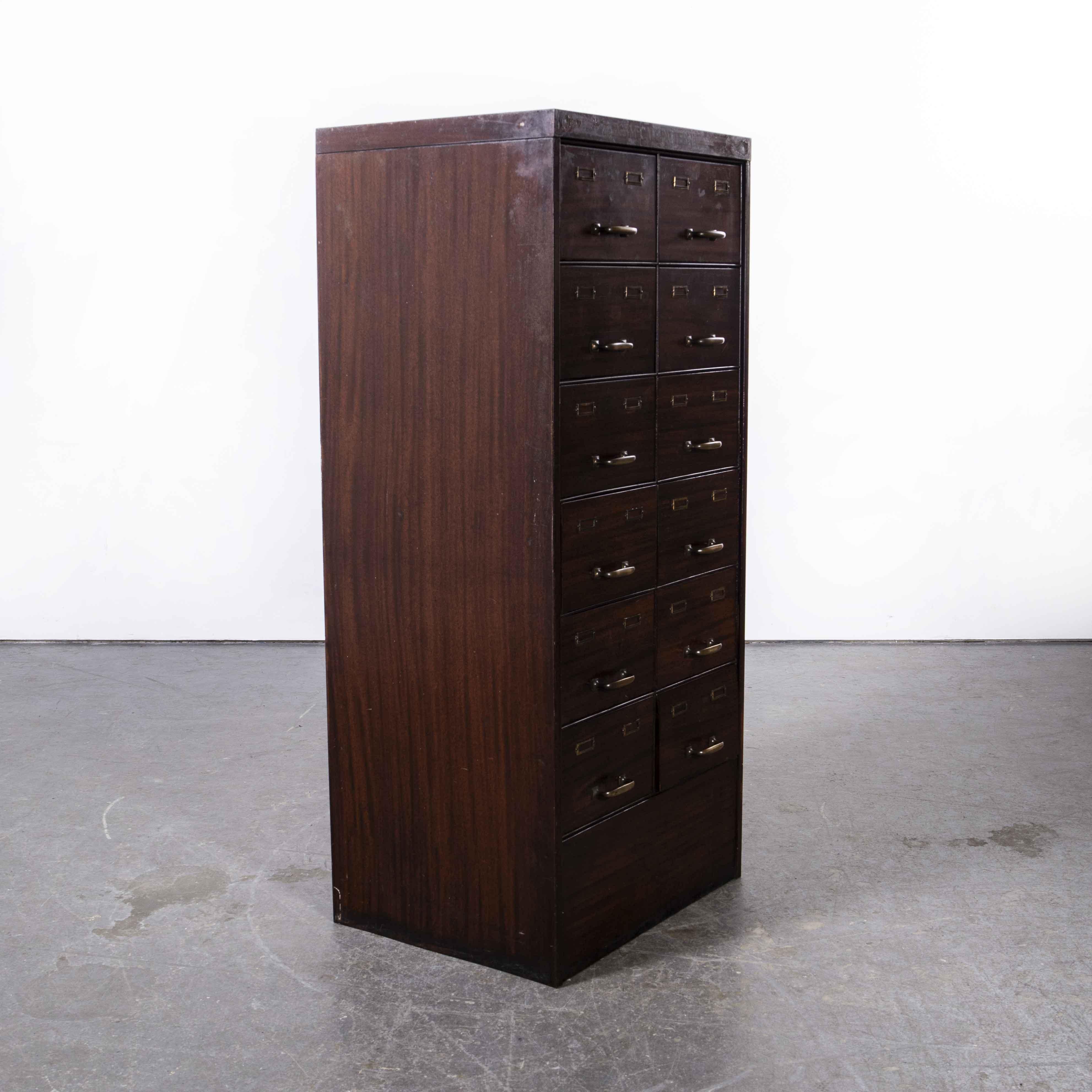 British 1920's Original Twelve Drawer Storage Cabinet, McCalls Pattern For Sale
