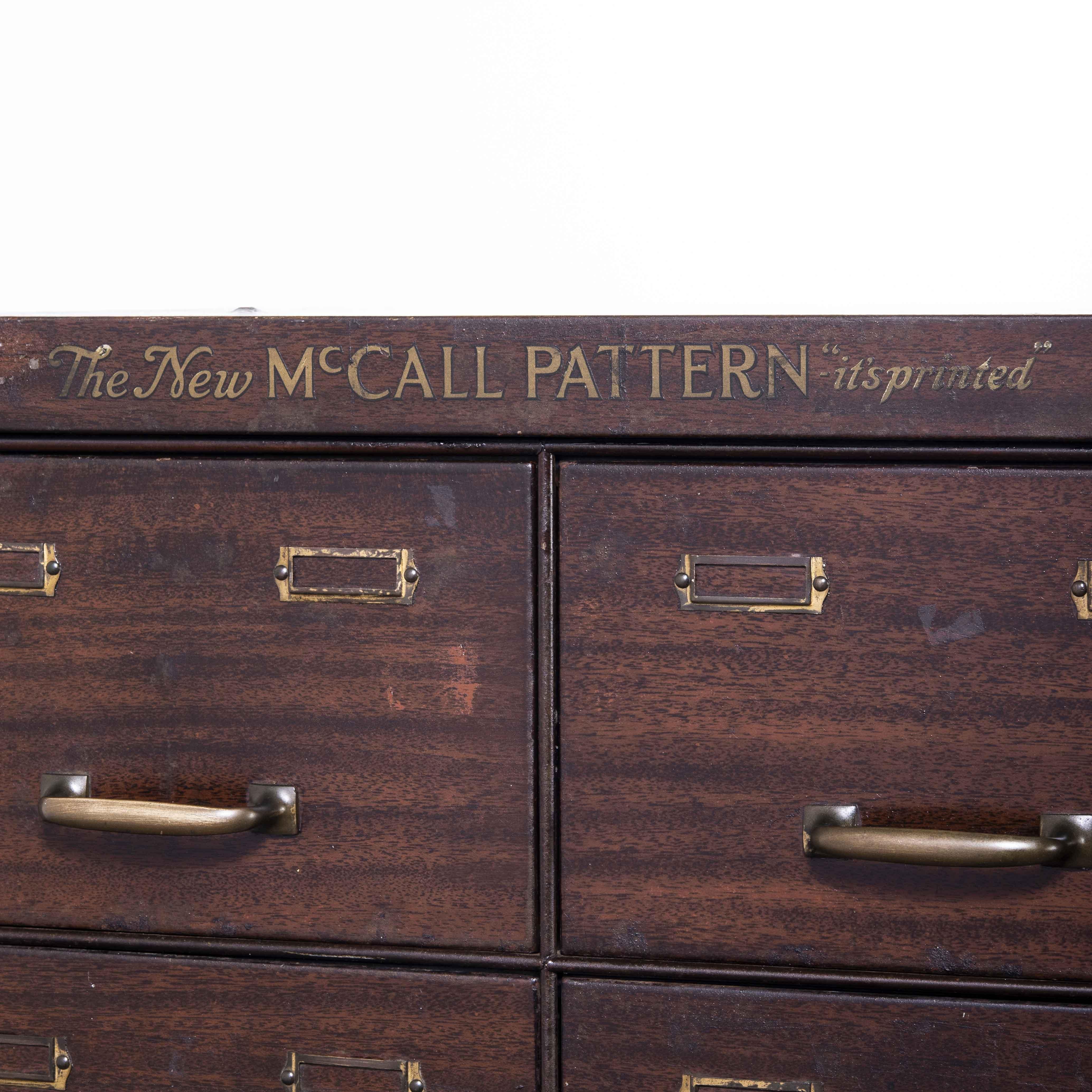 Wood 1920's Original Twelve Drawer Storage Cabinet, McCalls Pattern For Sale