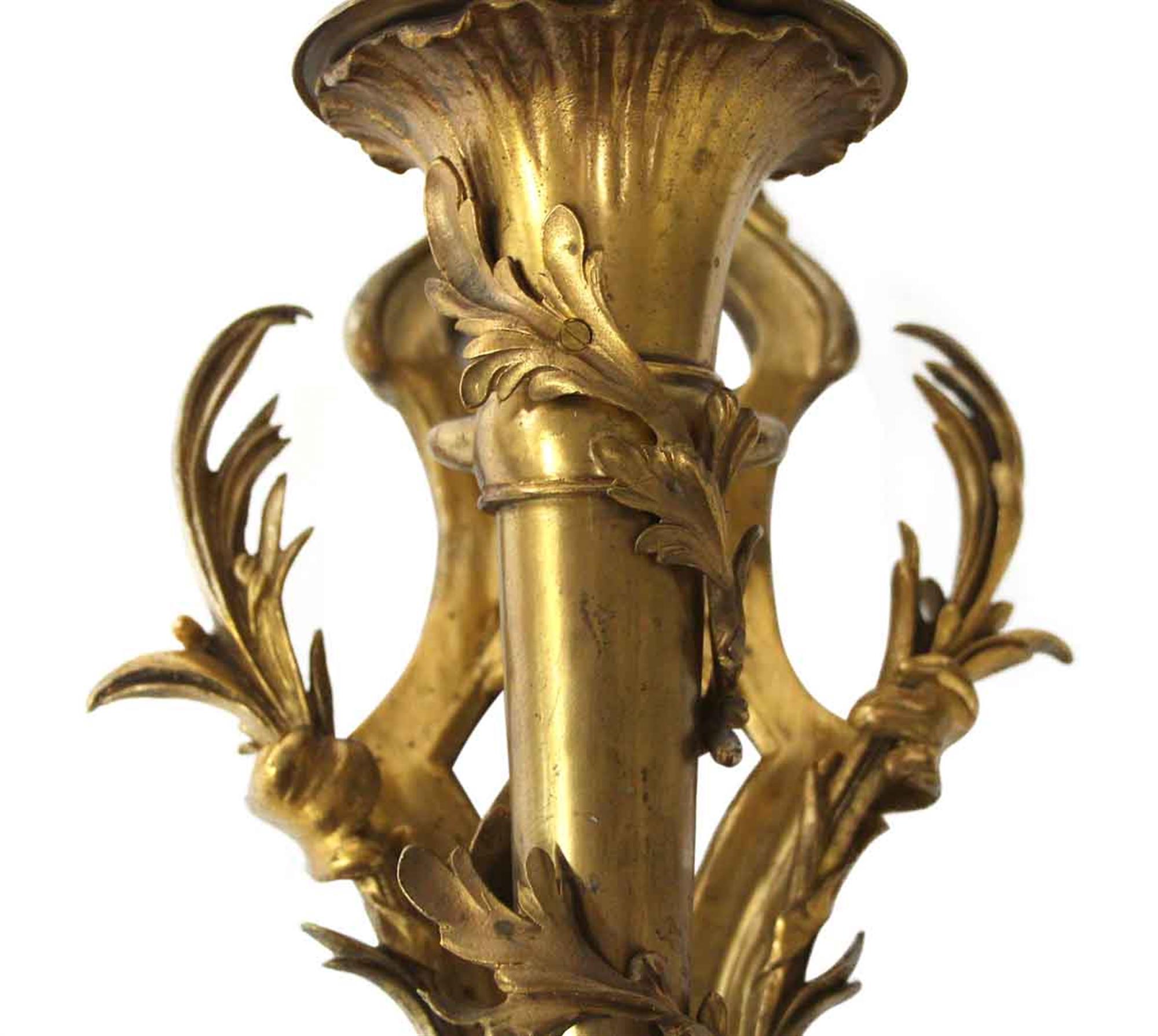 1920s Pair of Bronze Ornate Sconces with Glass Torch Shades In Good Condition In New York, NY