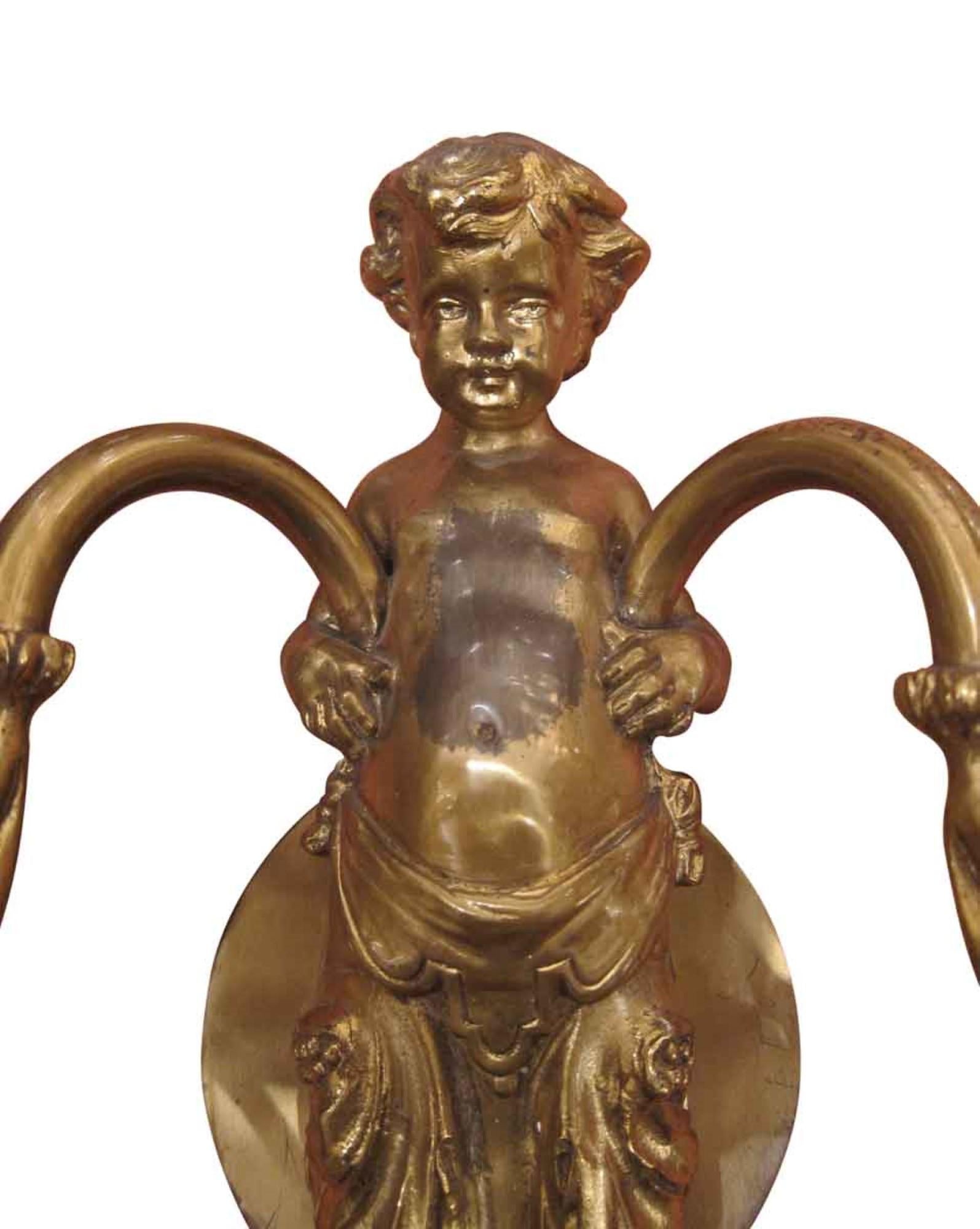 1920s Pair of Bronze Putti Sconces from an East 82nd St Apartment In Good Condition In New York, NY
