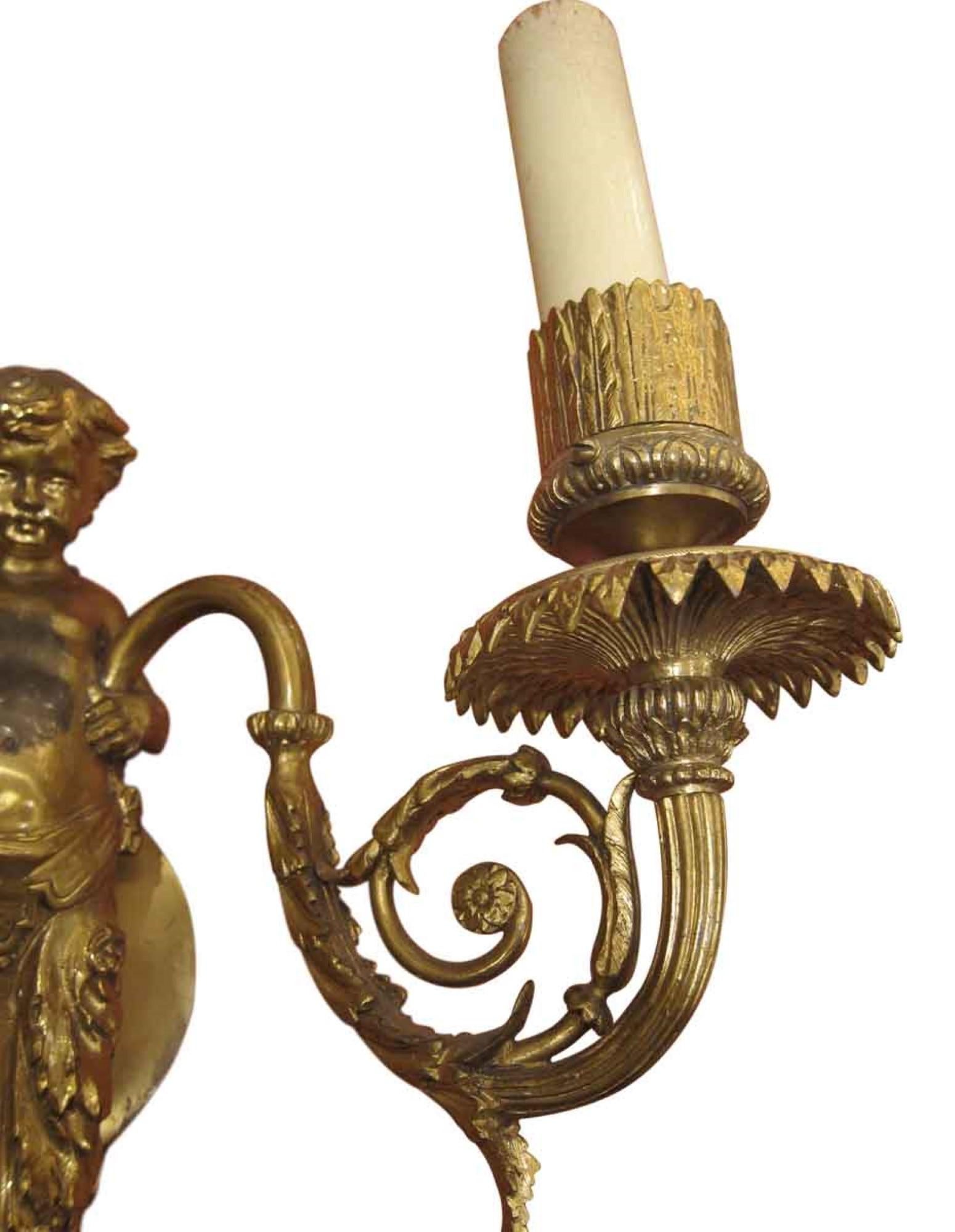 Early 20th Century 1920s Pair of Bronze Putti Sconces from an East 82nd St Apartment