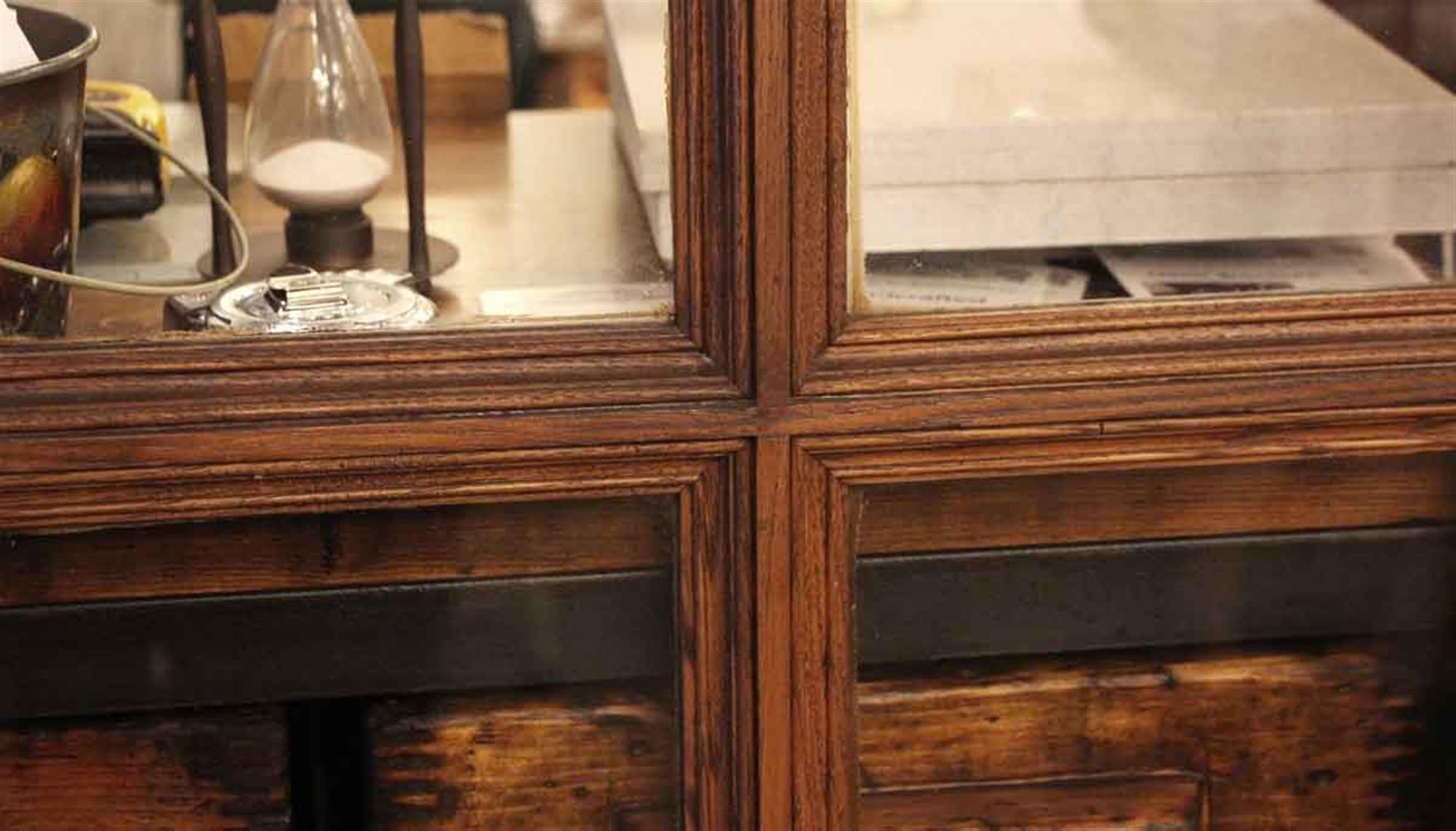 Medium wood tone chestnut French doors with 10 glass panes from the 1920s. Main picture shows the back of the doors with the bolt lock on door. There are three hinges on each door. Four pair available at time of posting. Please inquire. Priced per