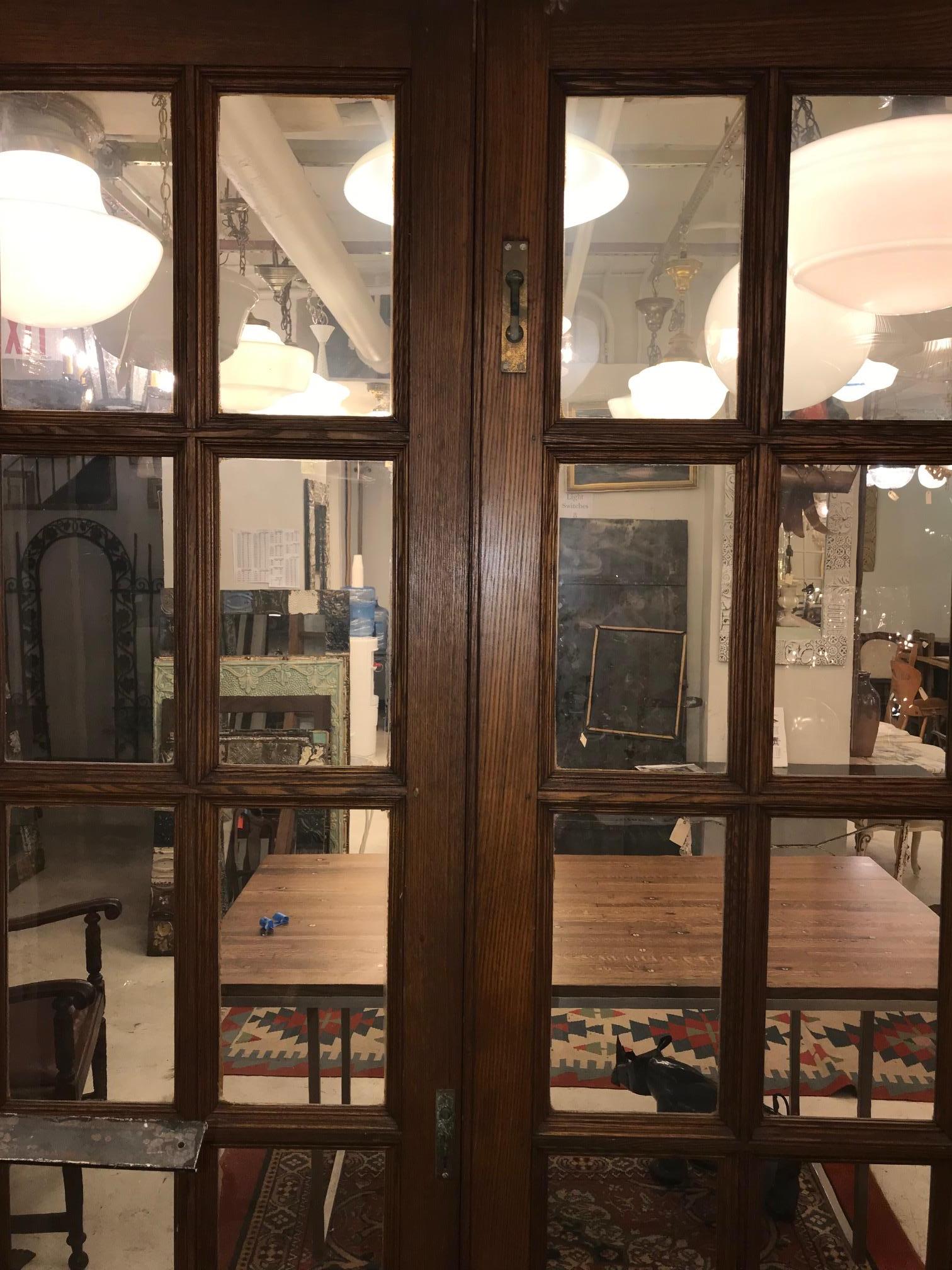 Early 20th Century 1920s Pair of Medium Tone Chestnut French Doors with 10 Glass Panes Each