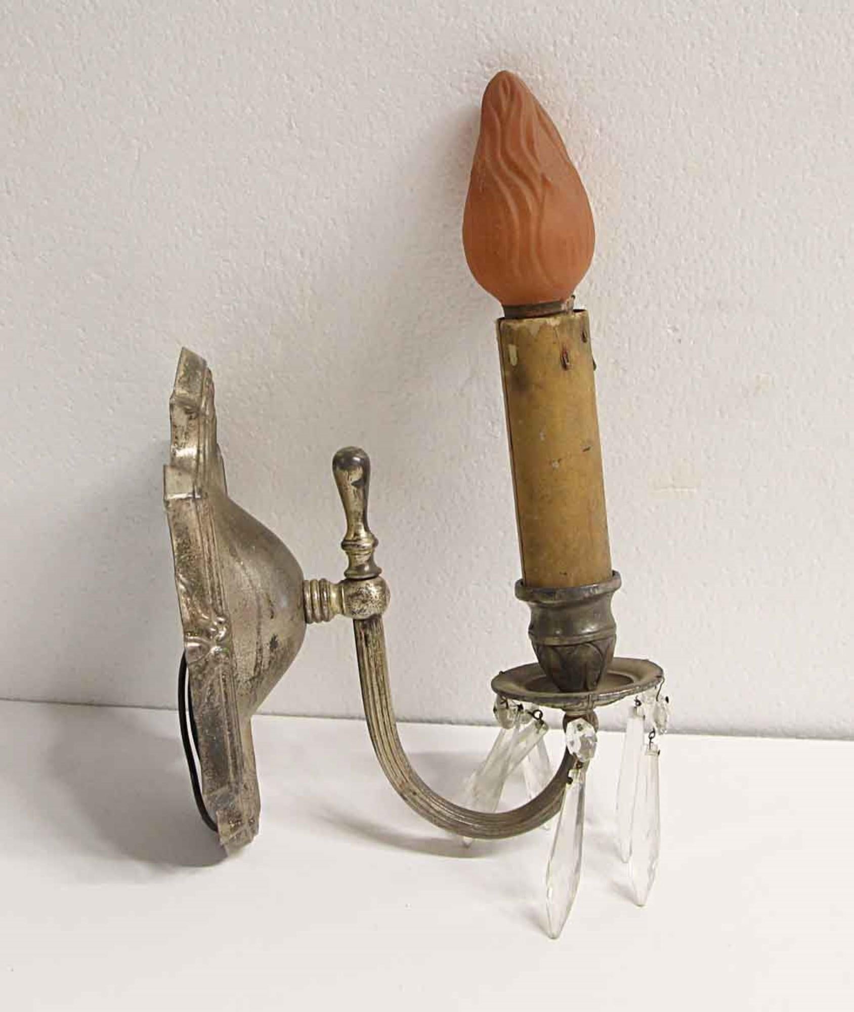 1920s brass Rococo style sconces with a silver finish. Sold as a pair. This can be seen at our 400 Gilligan St location in Scranton, PA.