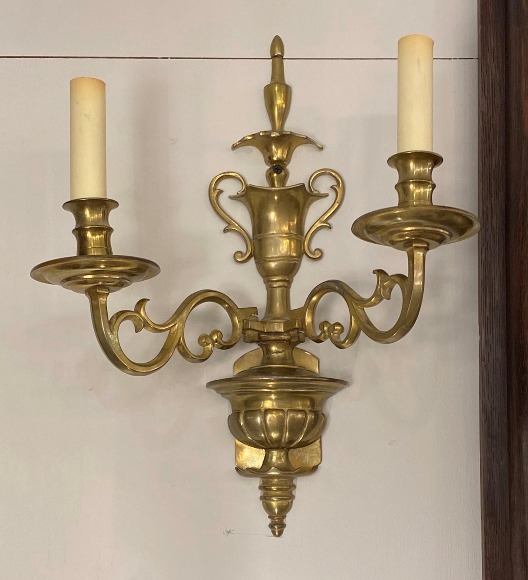 1920s pair of solid brass two arm sconces signed E.F. Caldwell, NYC. Cleaned and rewired. Please note, this item is located in one of our NYC locations.