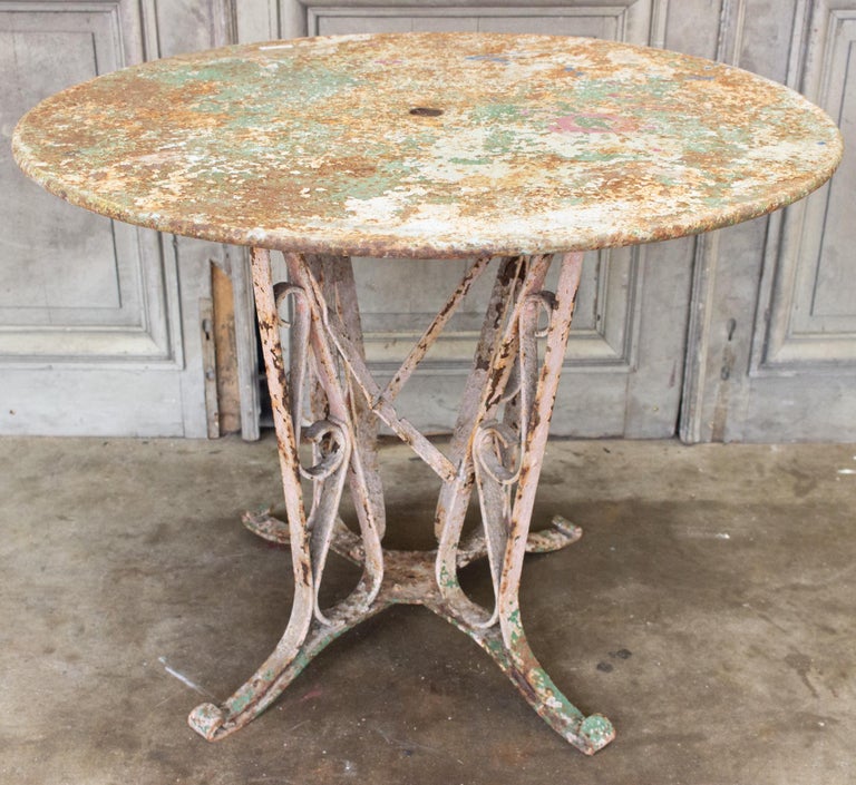 1920s Patinated French Painted Metal Garden Table with Worked Iron Base For Sale 6