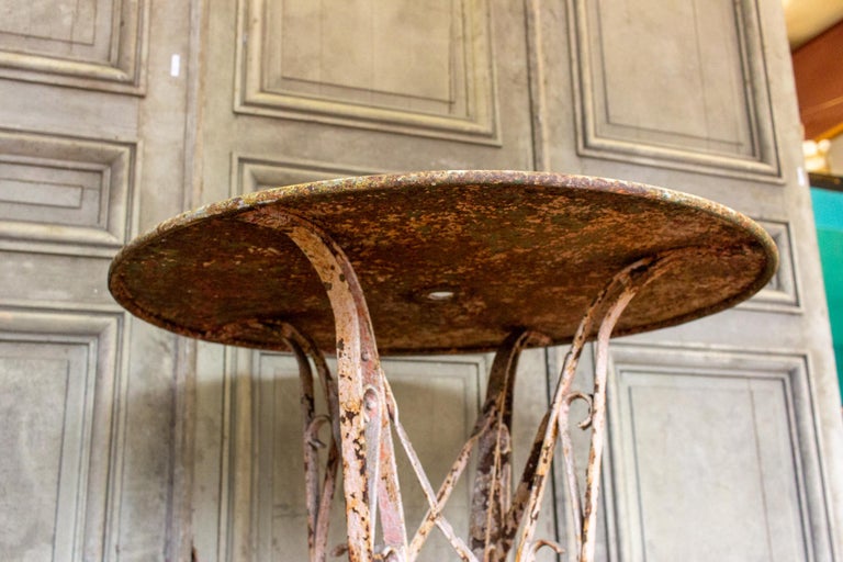 1920s Patinated French Painted Metal Garden Table with Worked Iron Base For Sale 10