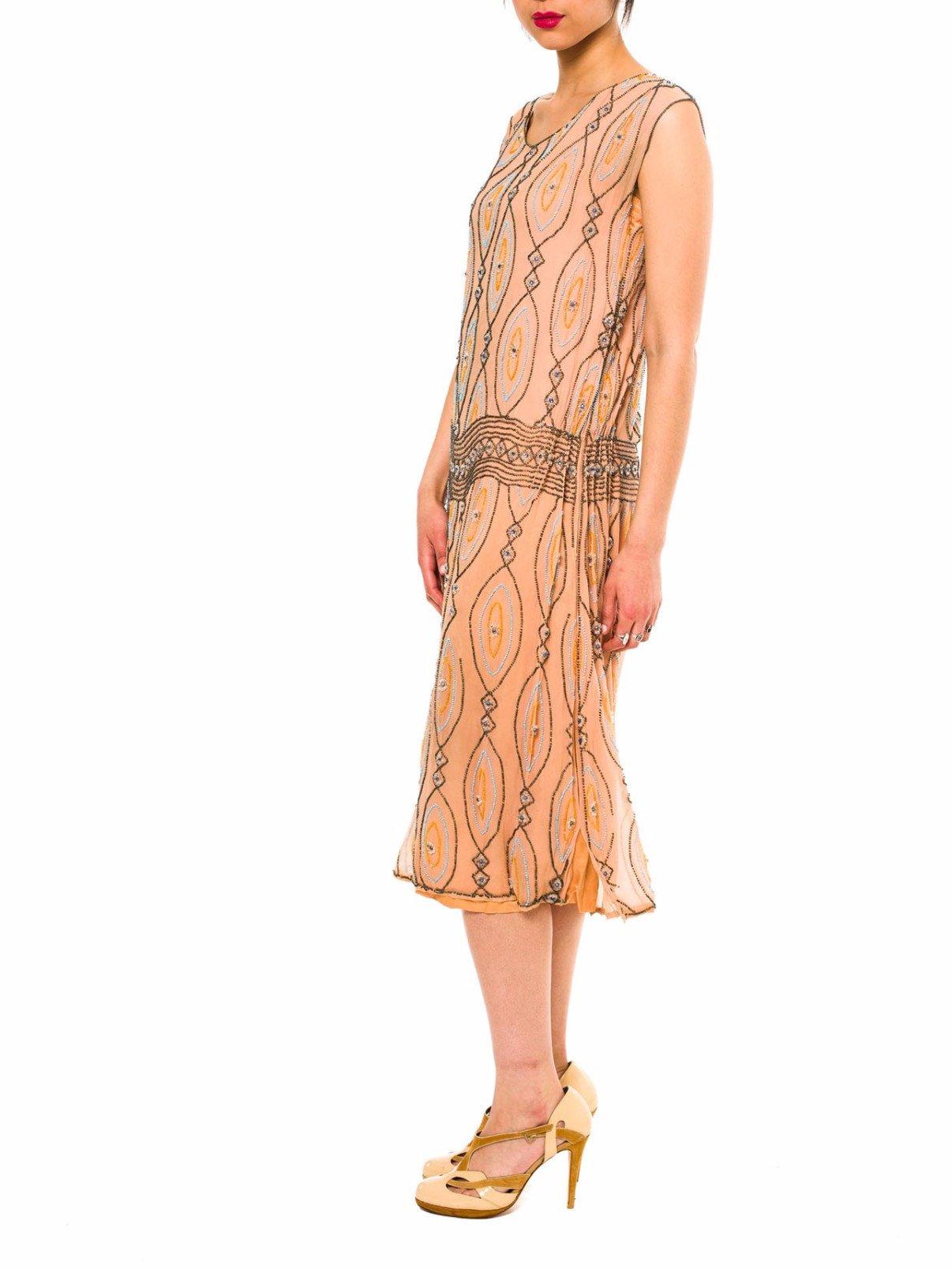 Dress has some damage and repaired areas at both shoulders and armholes. See detail images for reference.  1920S Peach Beaded Silk Chiffon Art Deco Flapper Cocktail Dress 