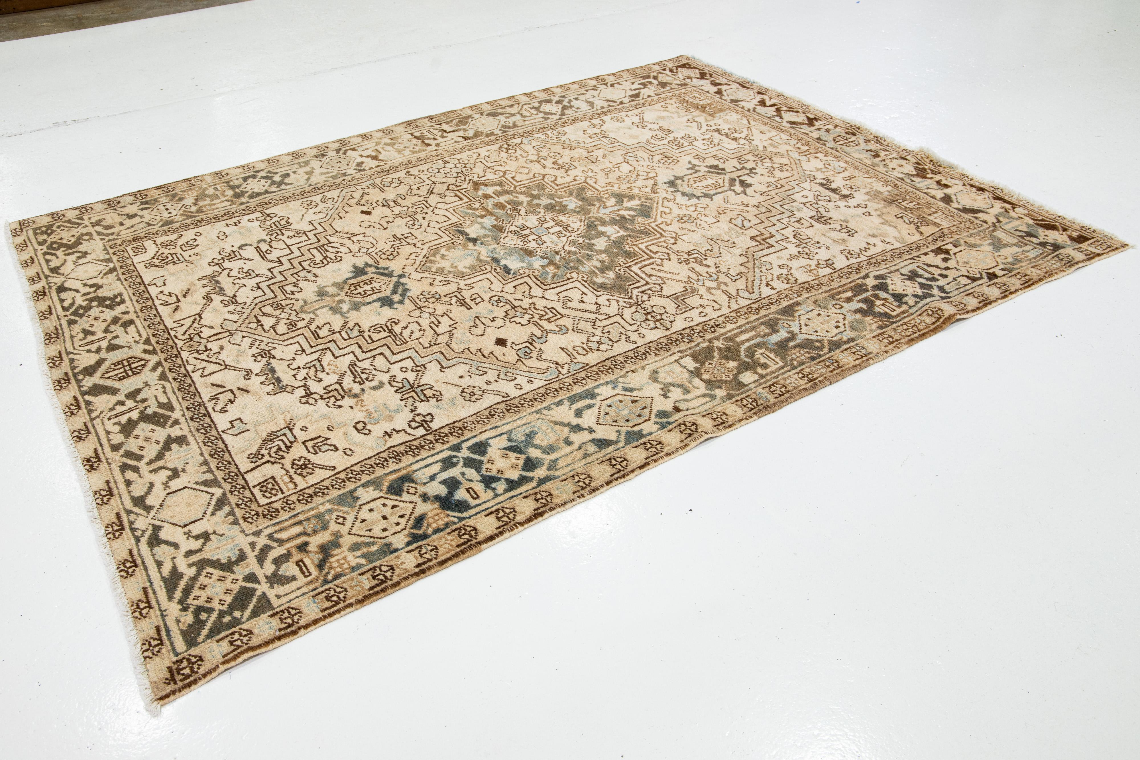 1920s Persian Antique Wool Rug In Beige with Medallion Design  In Excellent Condition For Sale In Norwalk, CT
