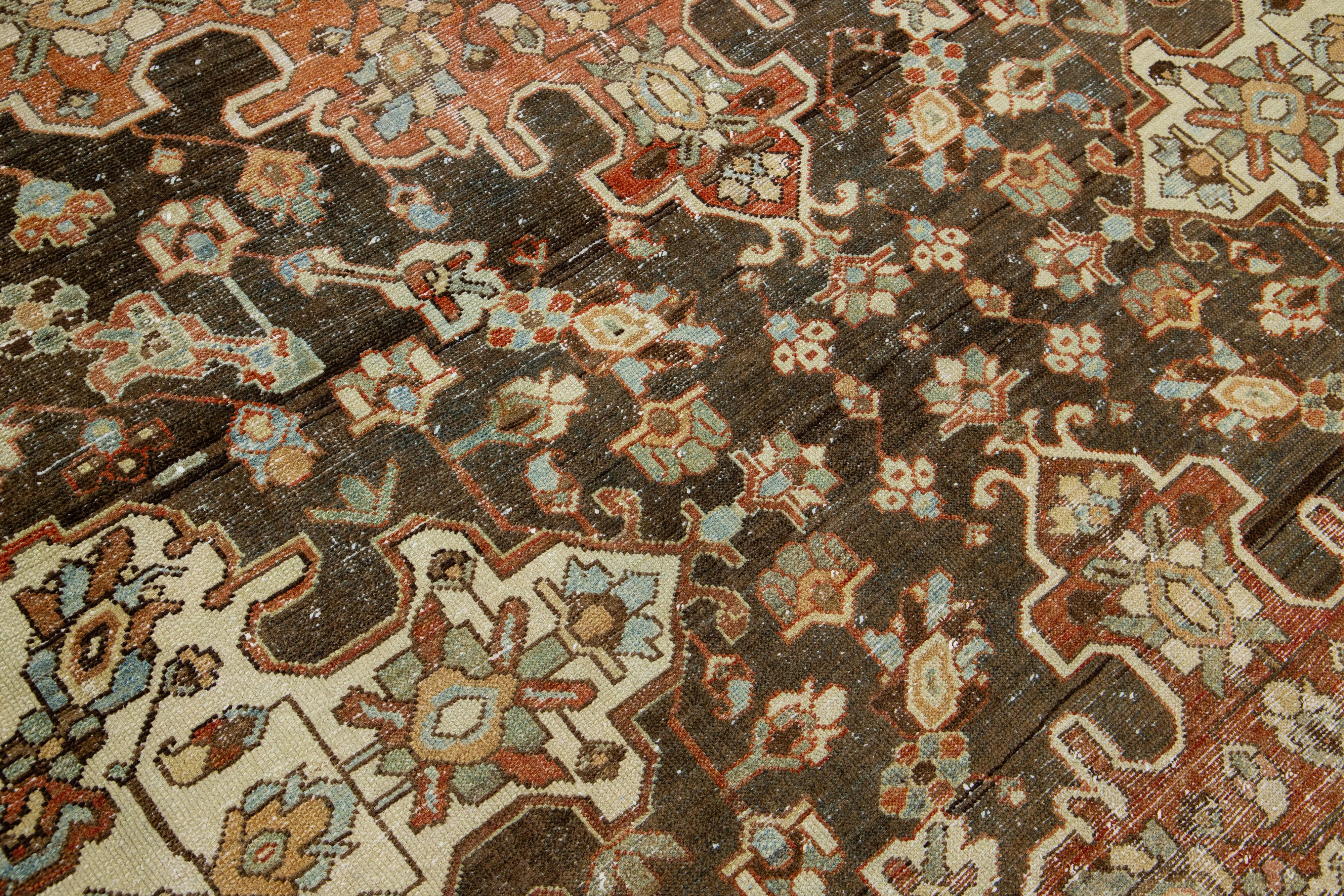 1920s Persian Bakhtiari Red Wool Rug With Multicolor Floral Motif For Sale 1