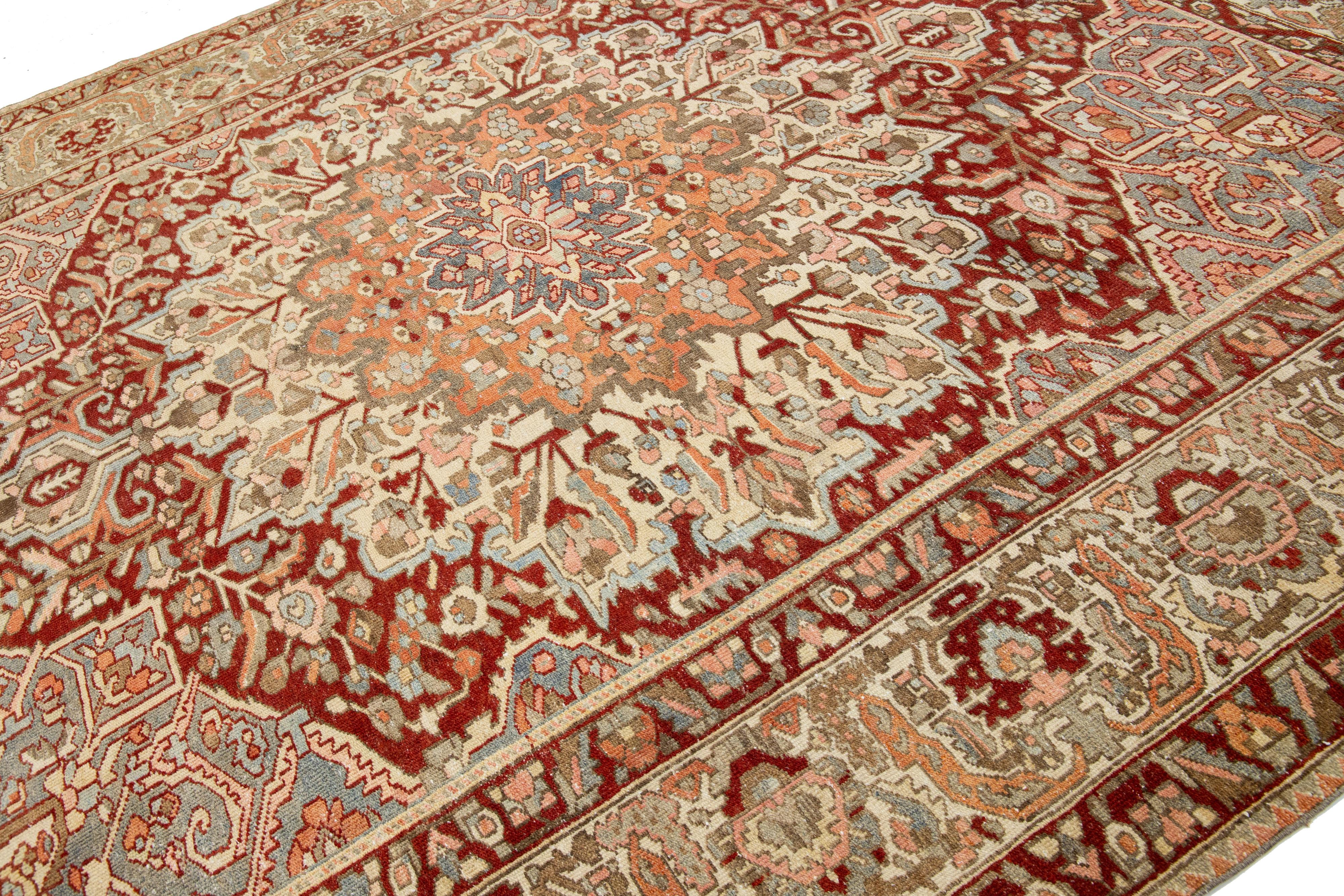 Hand-Knotted 1920s Persian Bakhtiari Wool Rug Handknotted With A Multicolor Rosette Motif For Sale