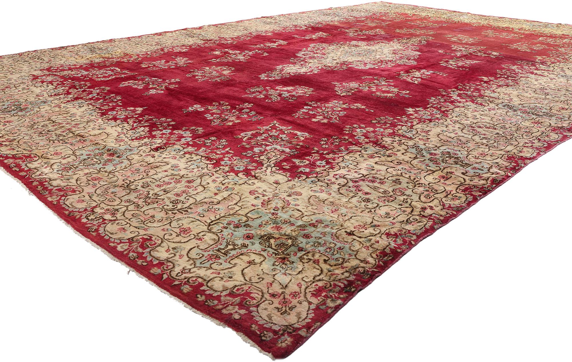 76516 Antique Red Persian Kerman Rug, 11'04 x 16'10. A masterpiece of Persian artistry, this hand-knotted antique Kerman rug captures the essence of refined elegance and timeless beauty. Woven in the grand tradition of 19th-century Kerman workshops,