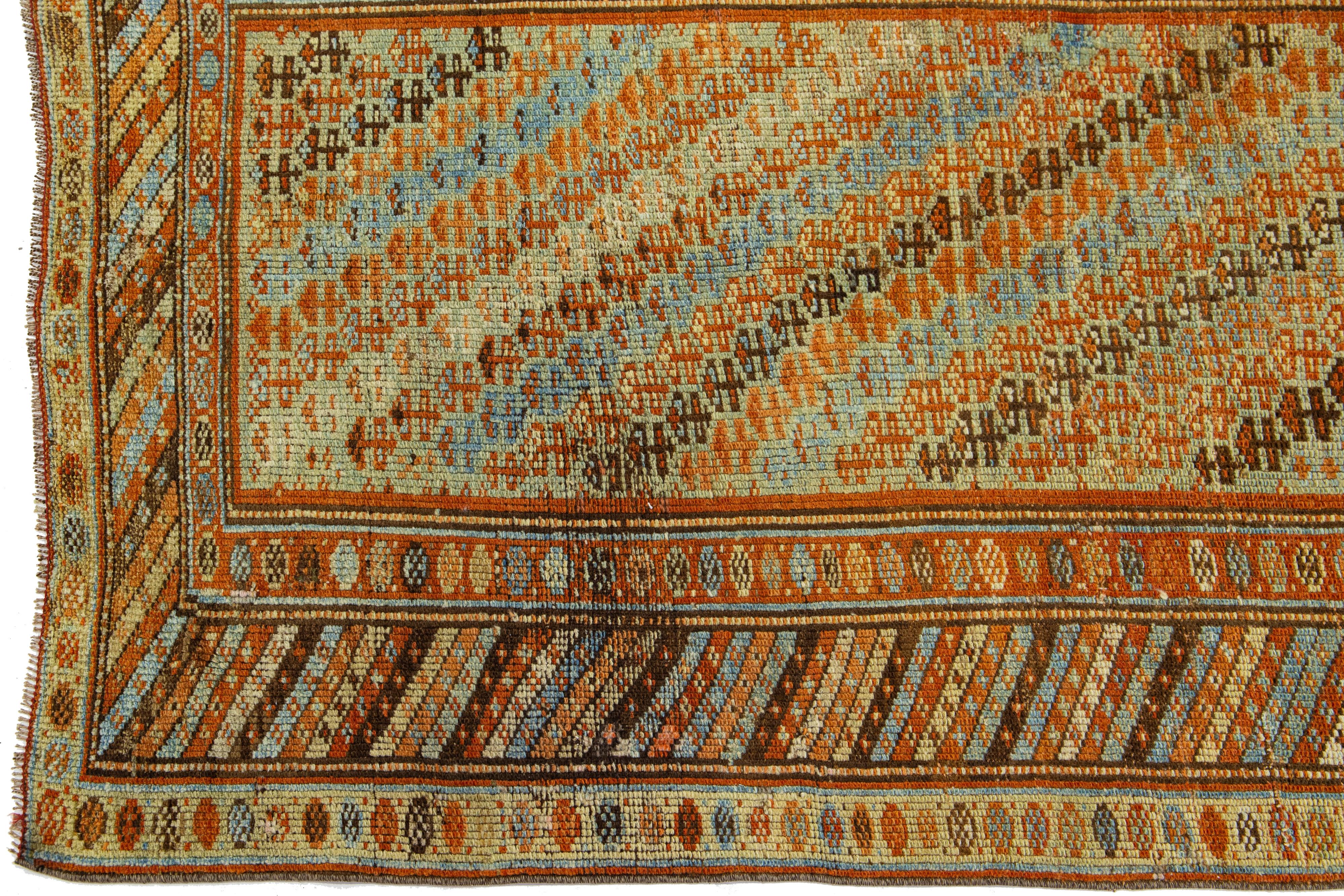 1920s Persian Kurdish Handmade Wool Runner with multicolor Geometric Design In Excellent Condition For Sale In Norwalk, CT
