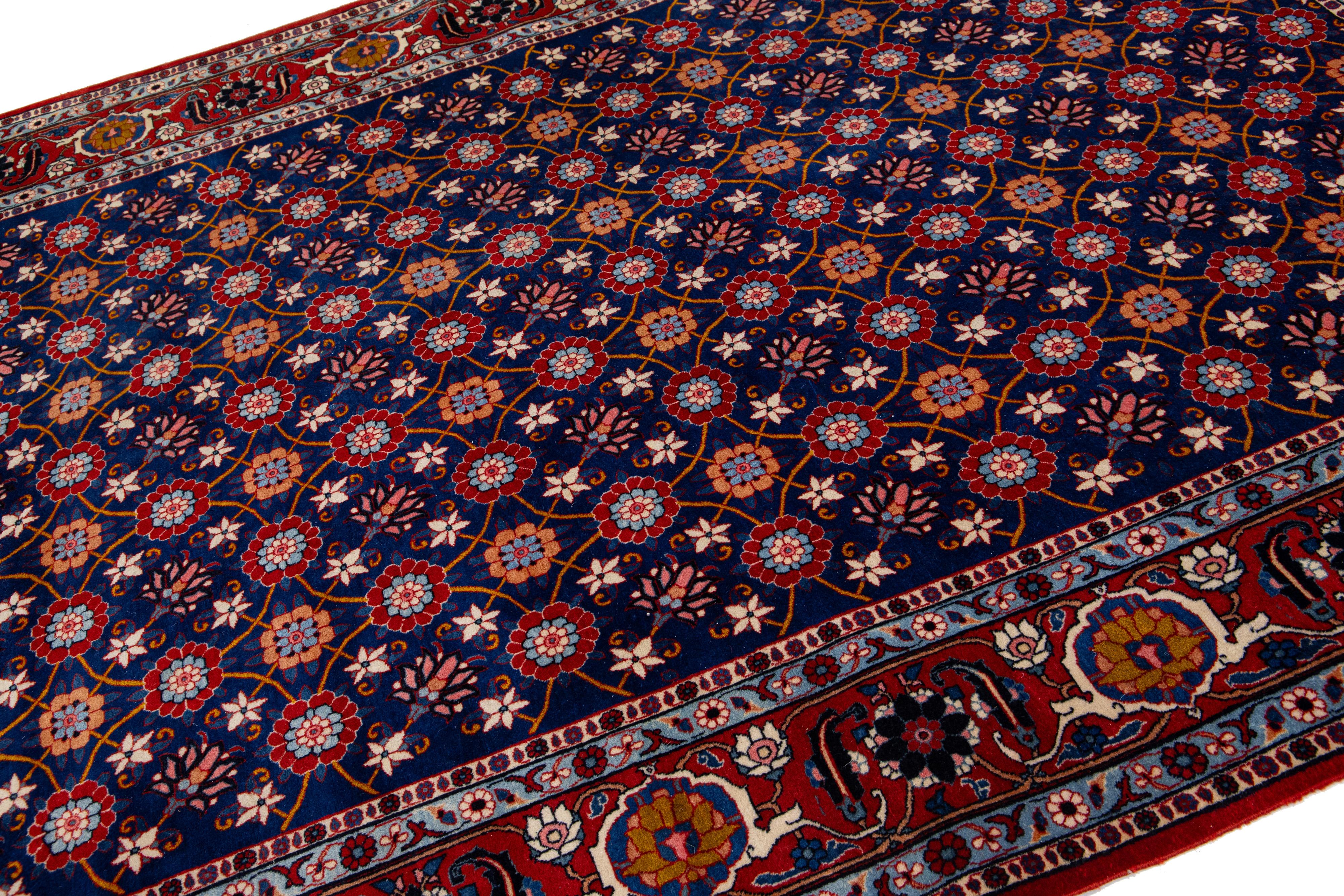 Hand-Knotted 1920s Persian Tabriz Wool Rug Adorned with Lavish Floral Pattern For Sale