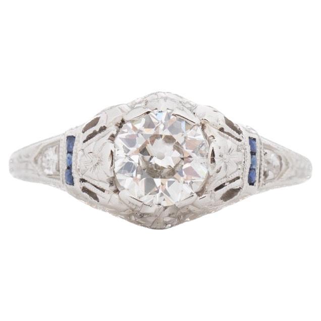 Jahr: 1920er Jahre

Artikel-Details:
Ringgröße: 6.5 (Größengerecht)
Metall-Typ: Platin   [Gepunzt und geprüft]
Gewicht:  3,5 Gramm

Zentrum Diamant Details:

GIA Bericht Nr.: 2235286953
Gewicht: .75ct Gesamtgewicht
Schliff: Alter europäischer