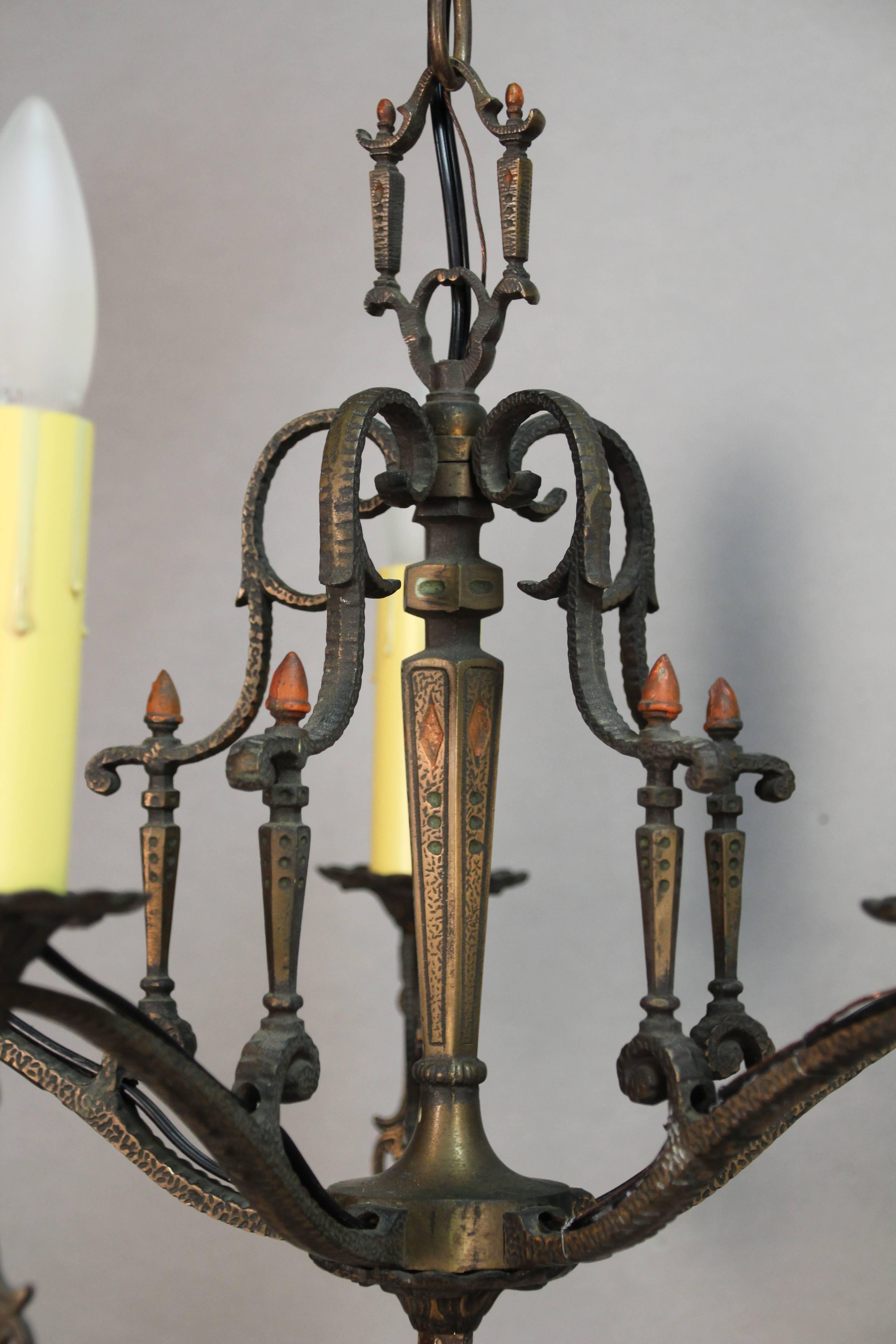 Attractive compact five-light Spanish Revival chandelier.