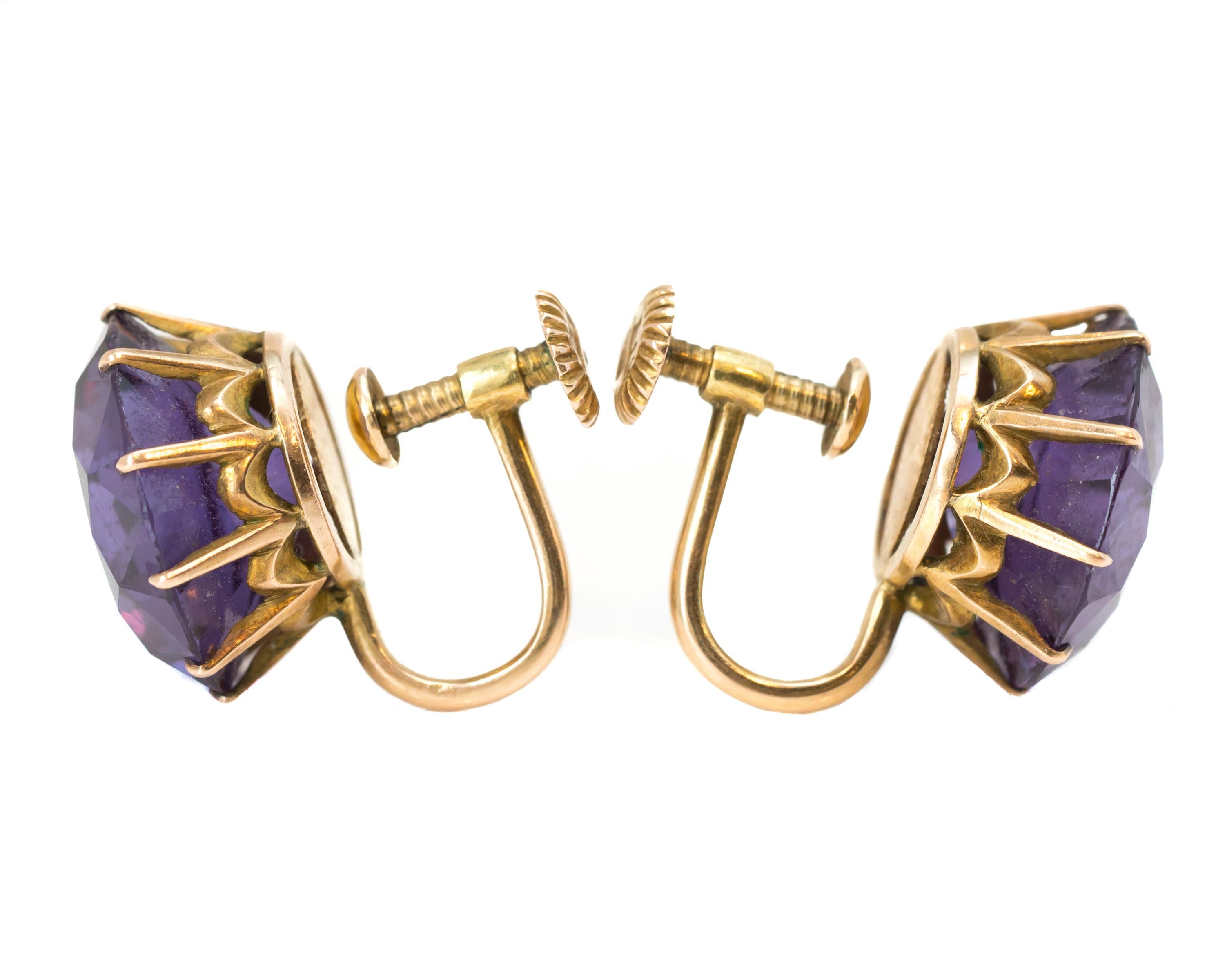 1920s Art Deco Round Synthetic Alexandrite Screw Back Clip On Earrings crafted in 14 karat Yellow Gold

Features:
Medium Purple Synthetic Alexandrite 
14 karat Yellow Gold Setting
Screw Back Clip On design
10-Prong Basket style Setting

Open setting