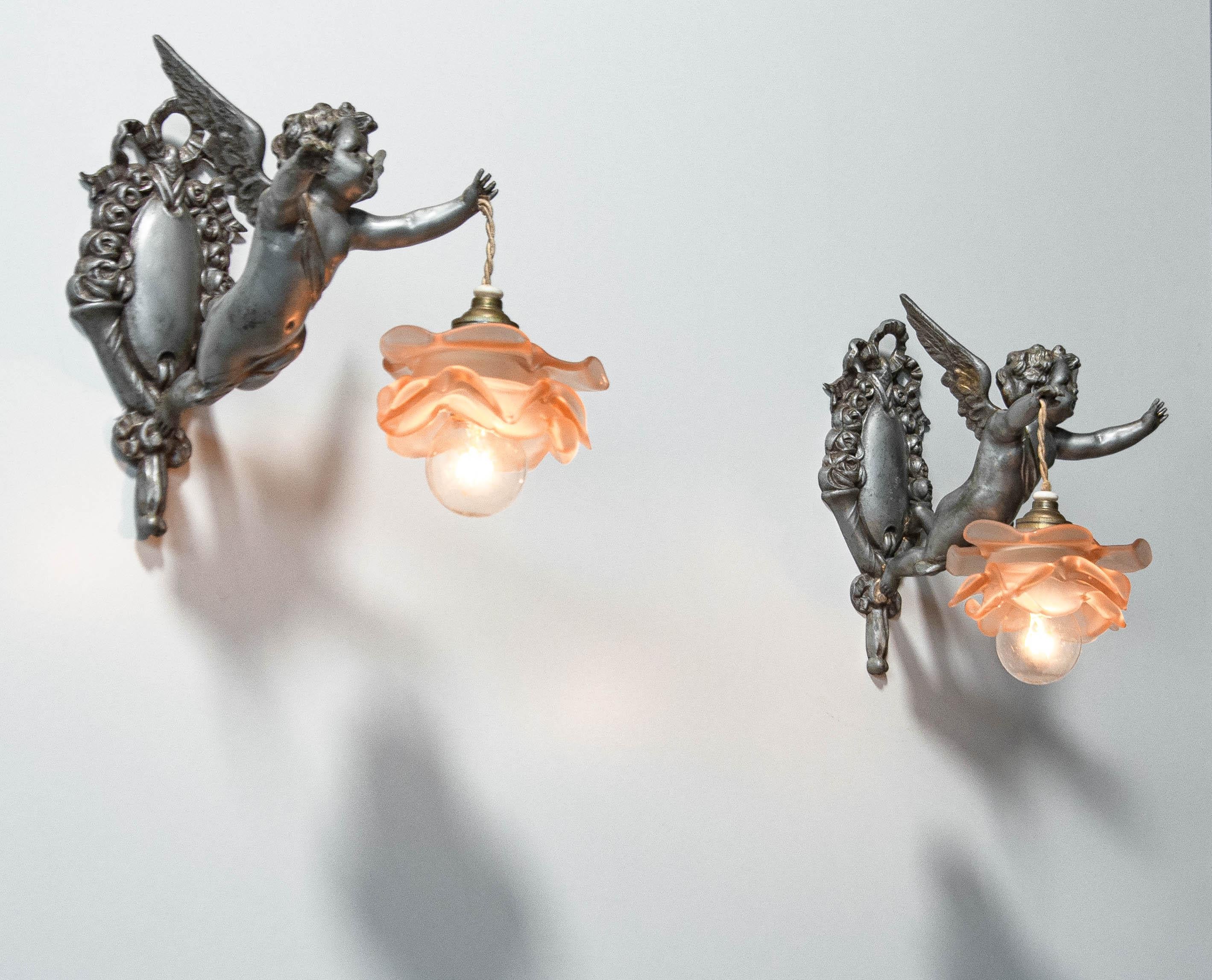 Early 20th Century 1920s Rare matching pair of French Rococo-style Pewter Wall Lights Sconces For Sale