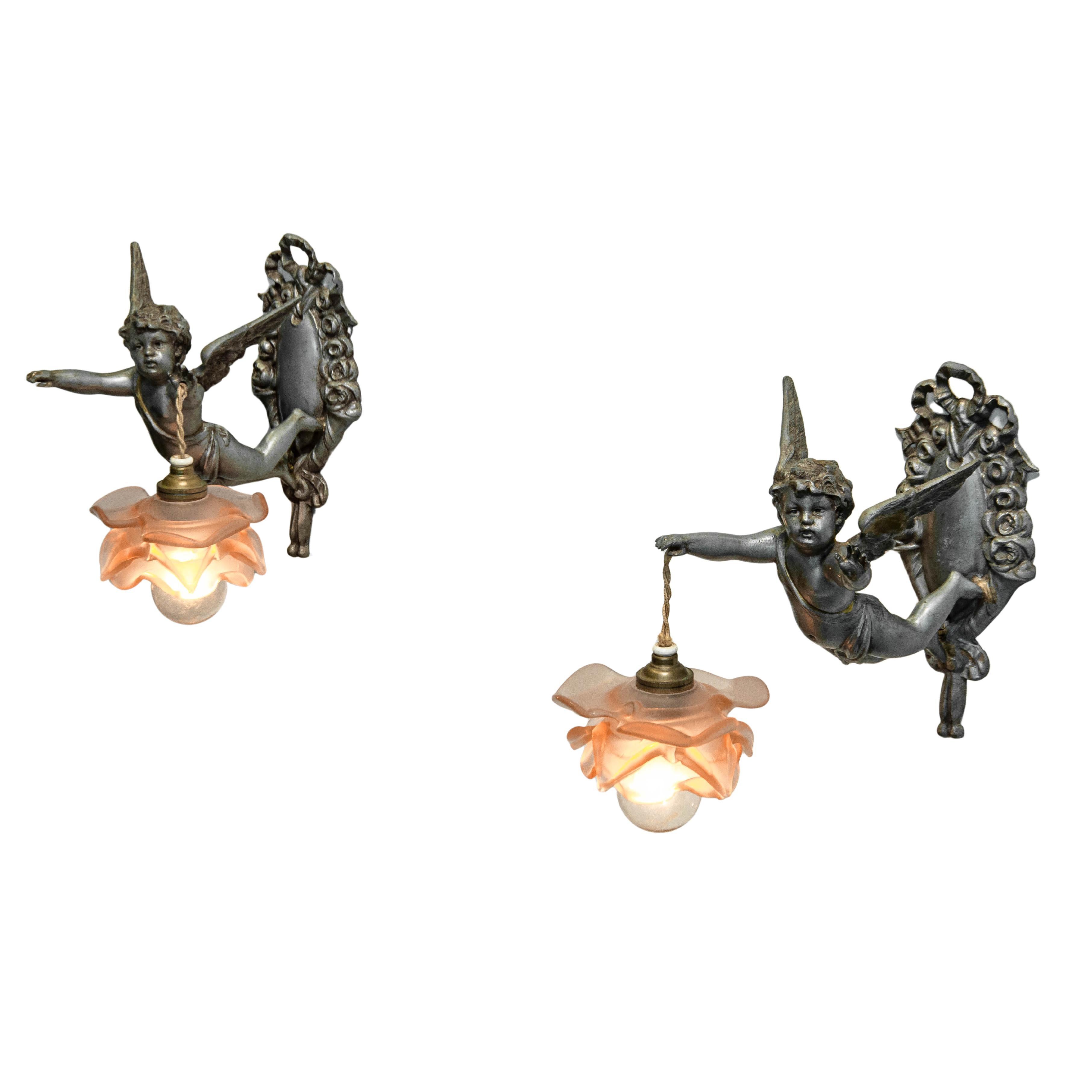 1920s Rare matching pair of French Rococo-style Pewter Wall Lights Sconces For Sale